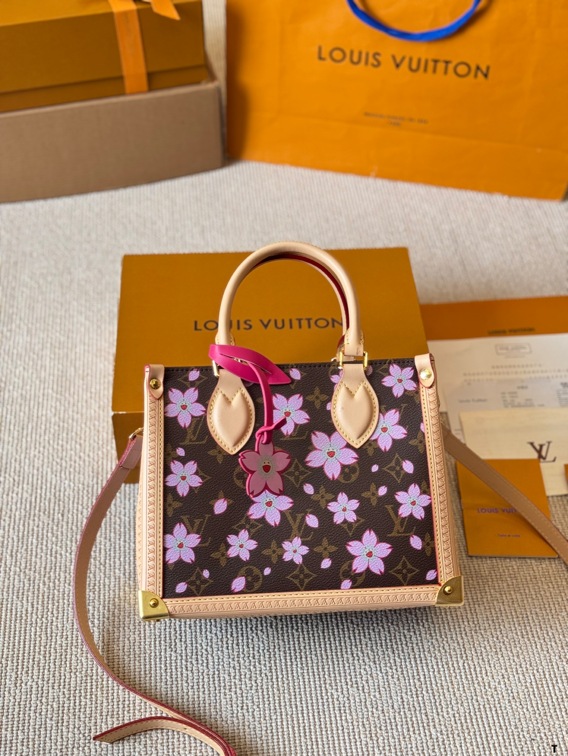 LV Onthego printed jungle bag