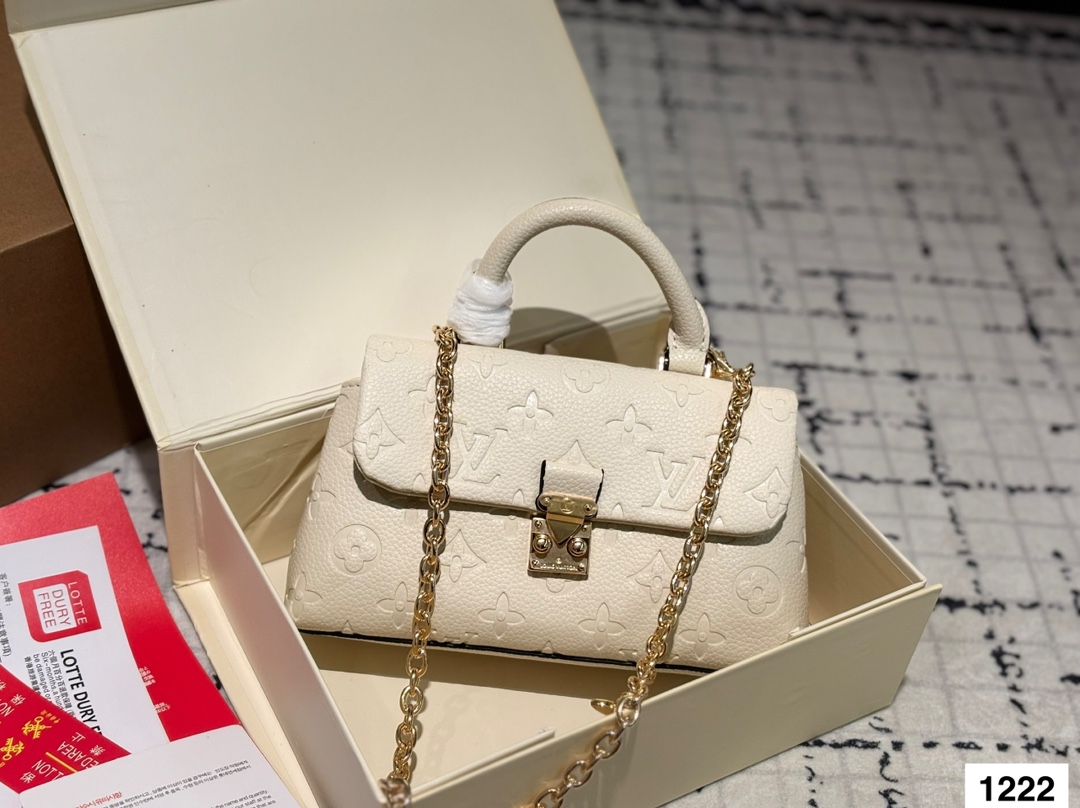 LV embossed madeleine bb bag