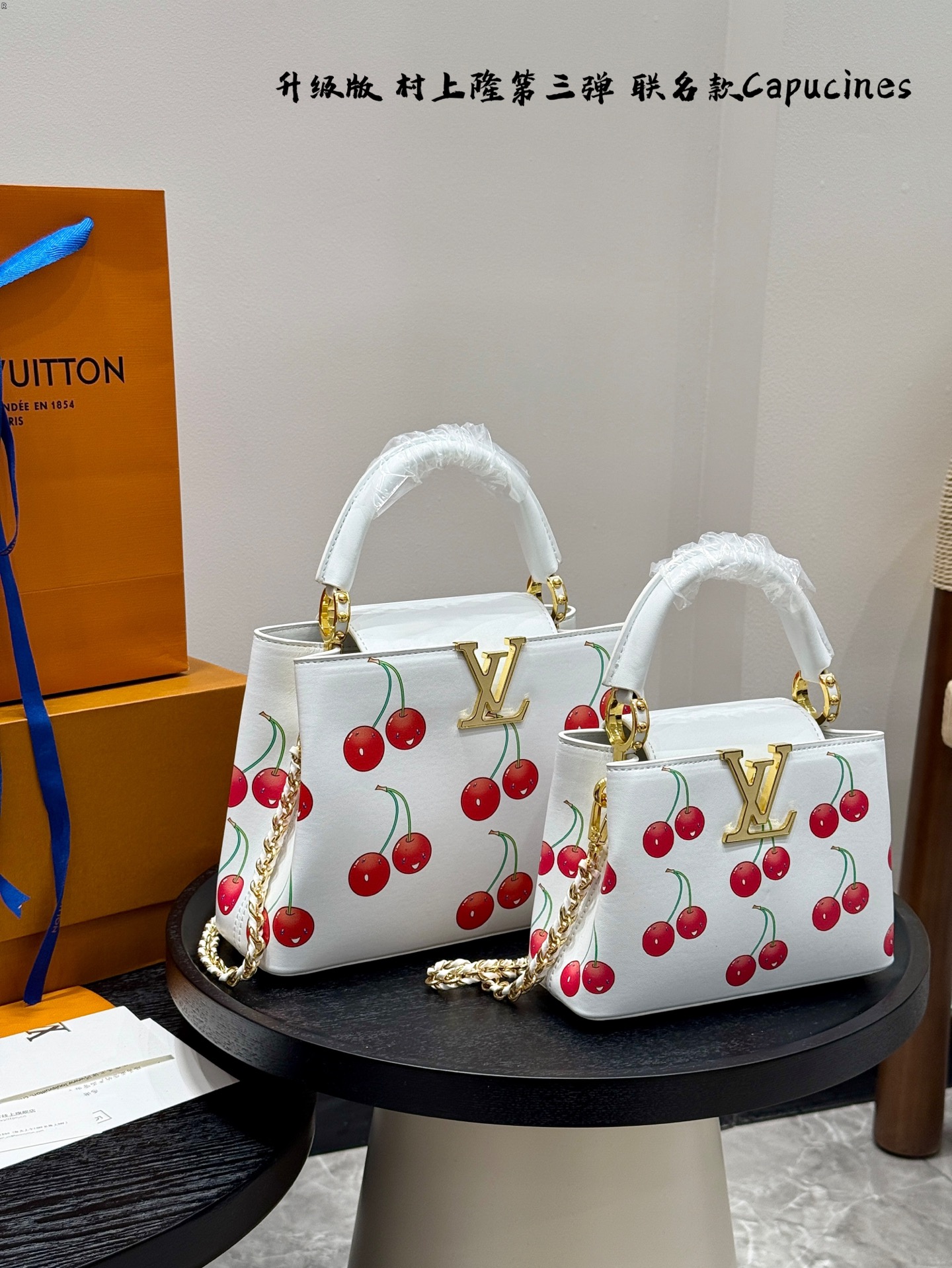 LV capucines cherry handbag