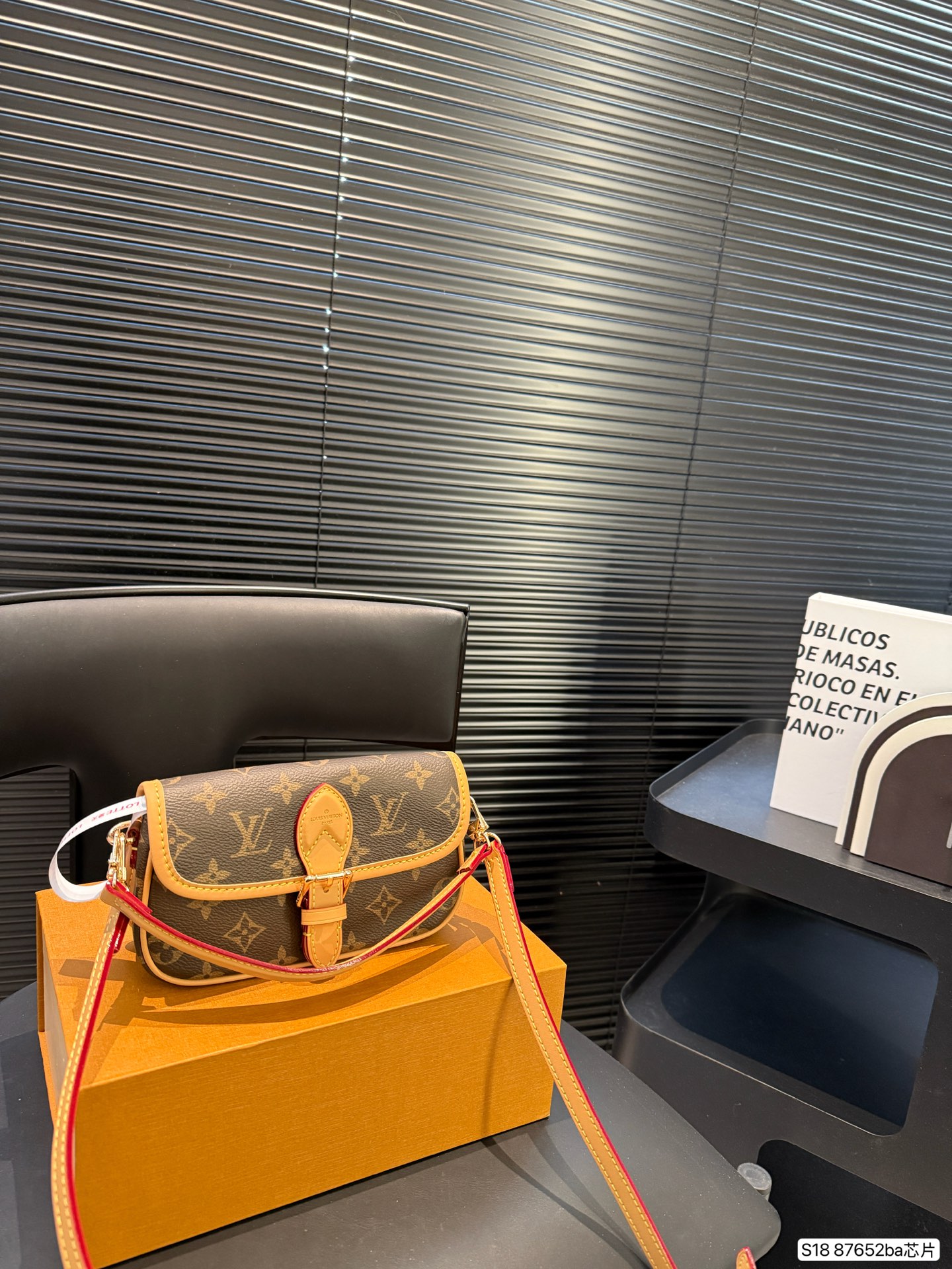 Louis Vuitton's worldly white three-color cross-body handbag is playful and cute