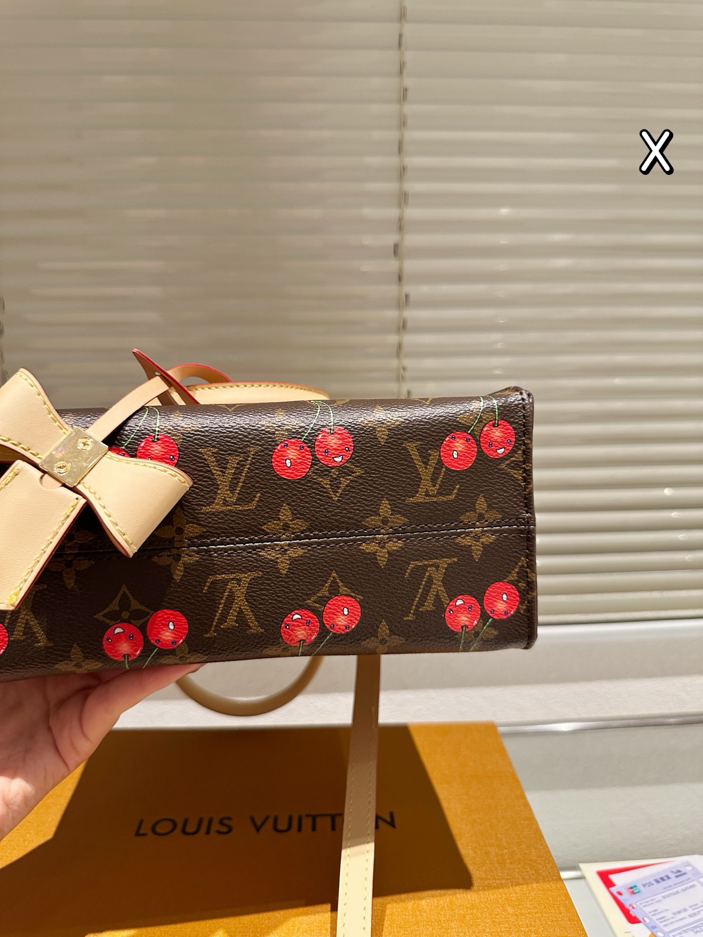 LV Onthego cherry print bag