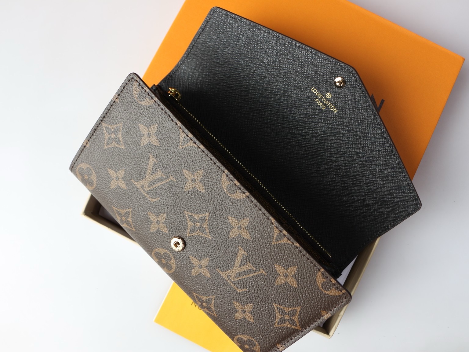 LV wallet square envelope style imprinted snap button