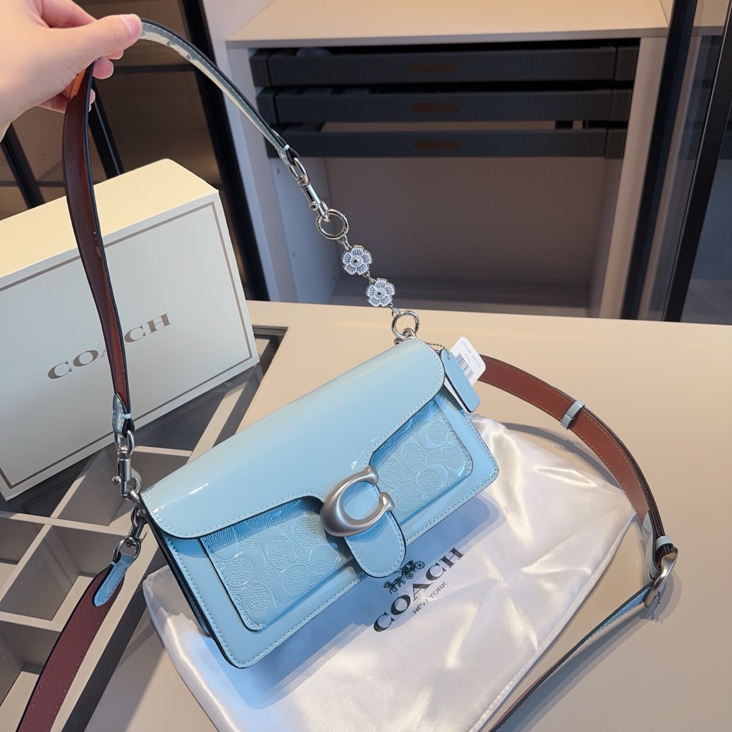 Coach's new patent leather embossed Dionysus bag tall version