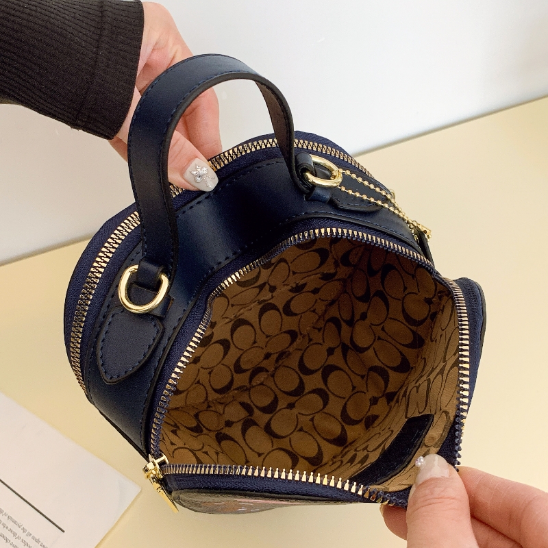 Coach's new cherry heart shoulder crossbody bag