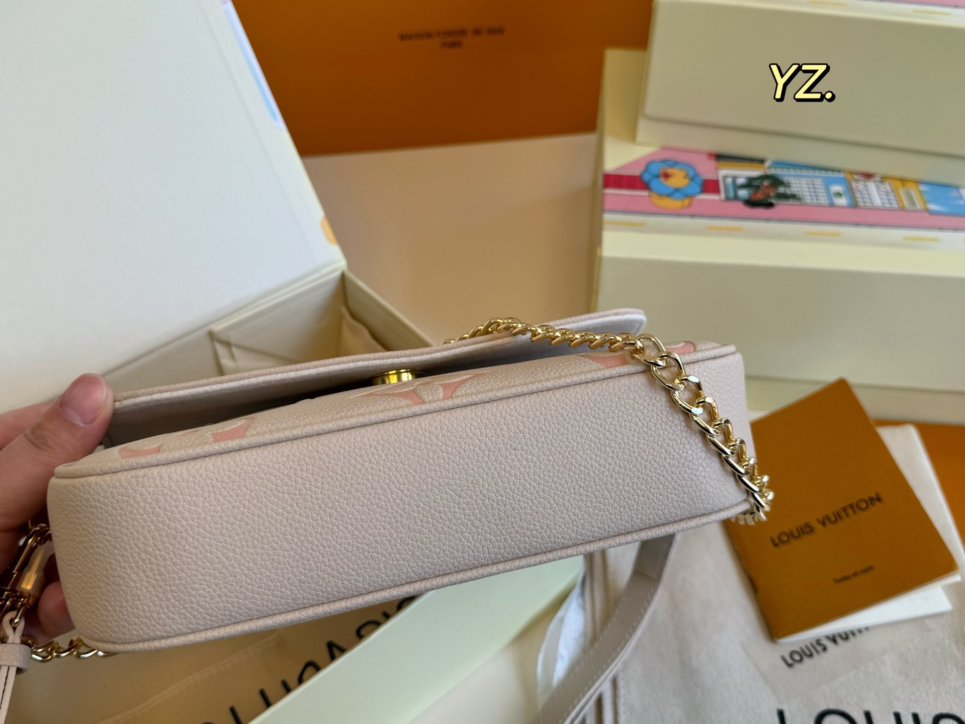 Louis Vuitton embossed mahjong bag armpit bag