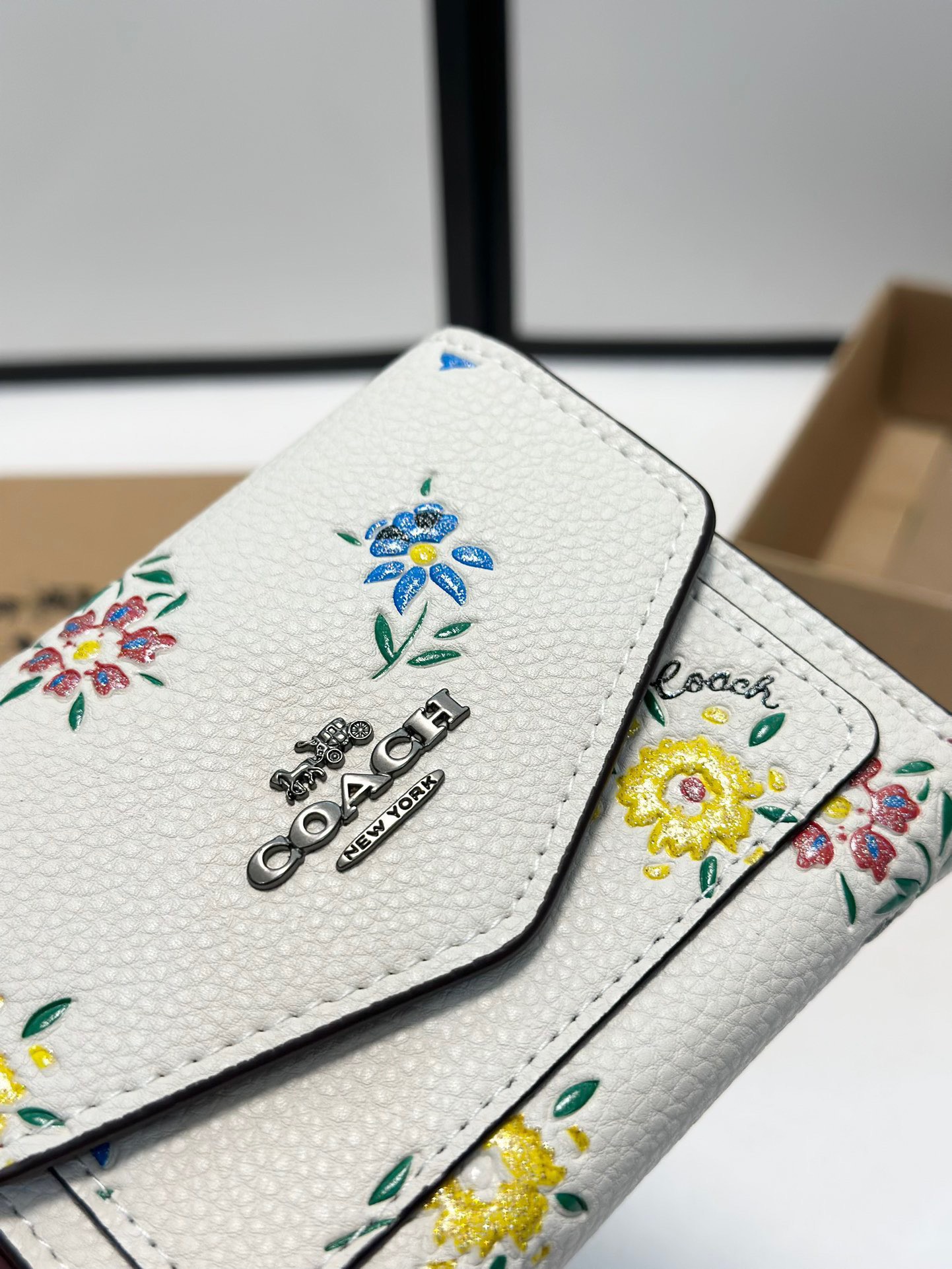 Coach printed tri-fold short wallet