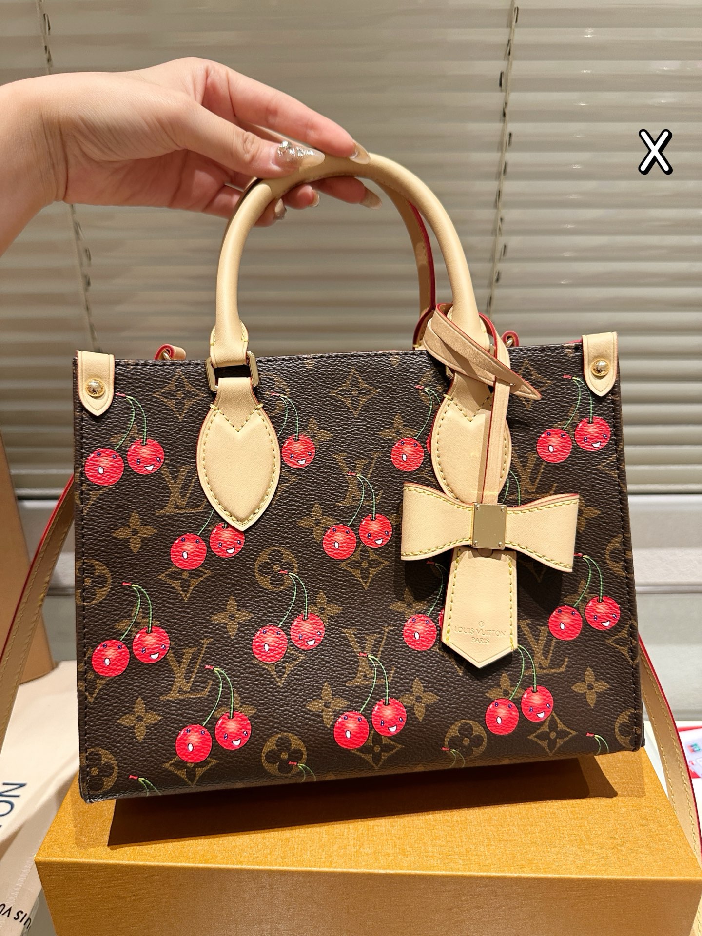 LV Onthego cherry print bag