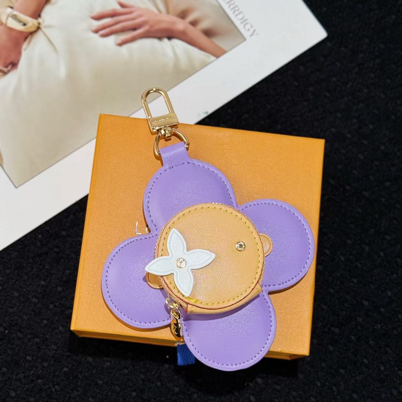 Louis Vuitton vivienne Sunflower Coin Purse pendant