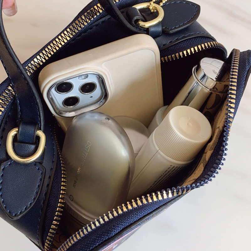 Coach's new cherry heart shoulder crossbody bag