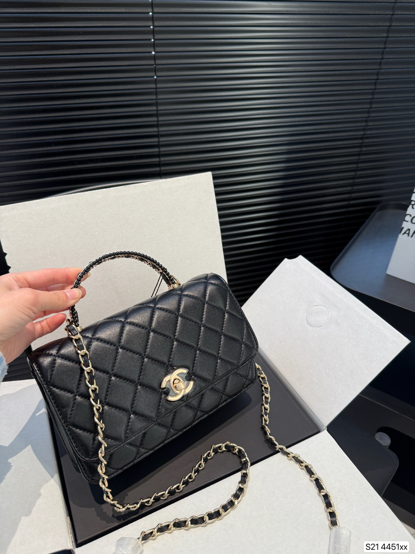 Chanel hand-held chain bag