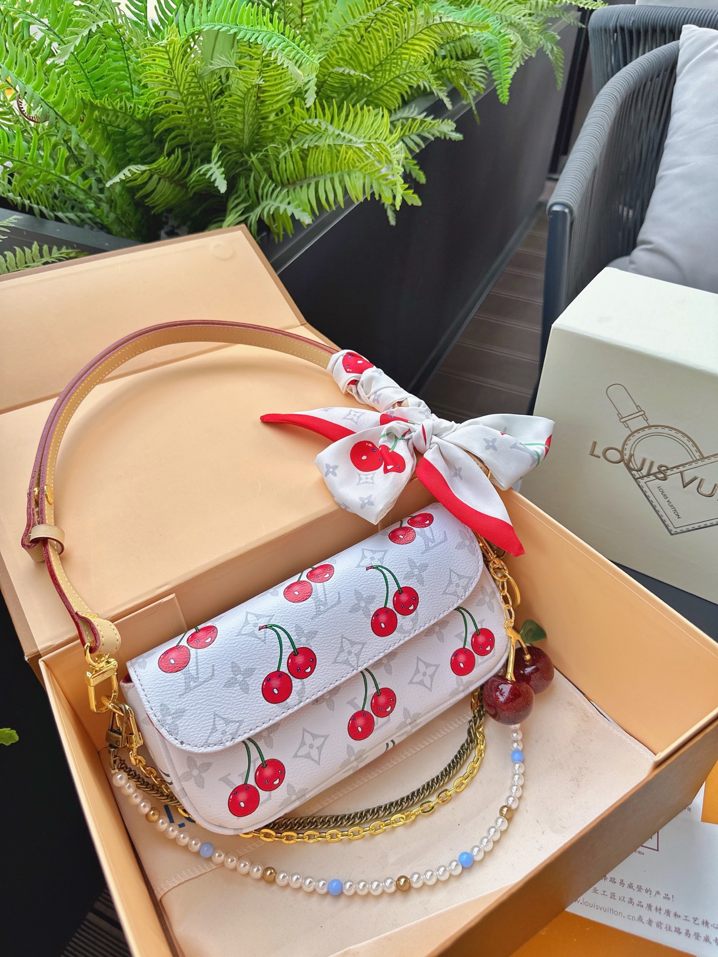 LV ivy woc cherry bag
