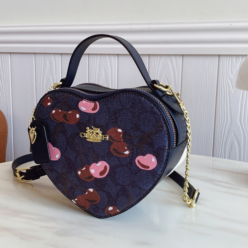 Coach's new cherry heart shoulder crossbody bag