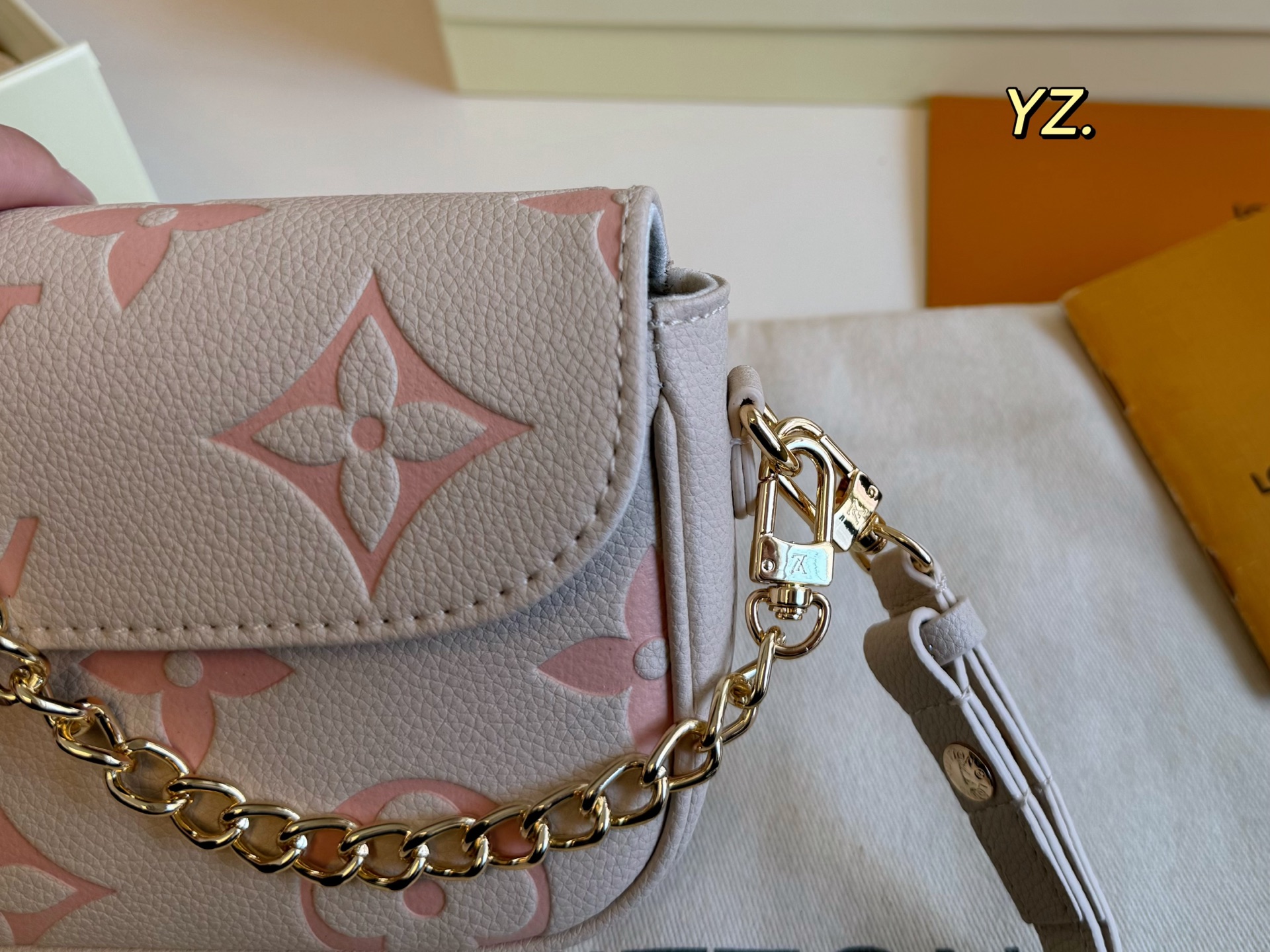 Louis Vuitton embossed mahjong bag armpit bag