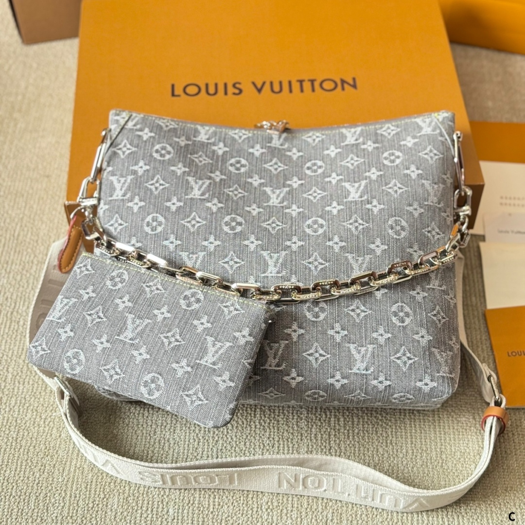 Lv Coussin clutch bag