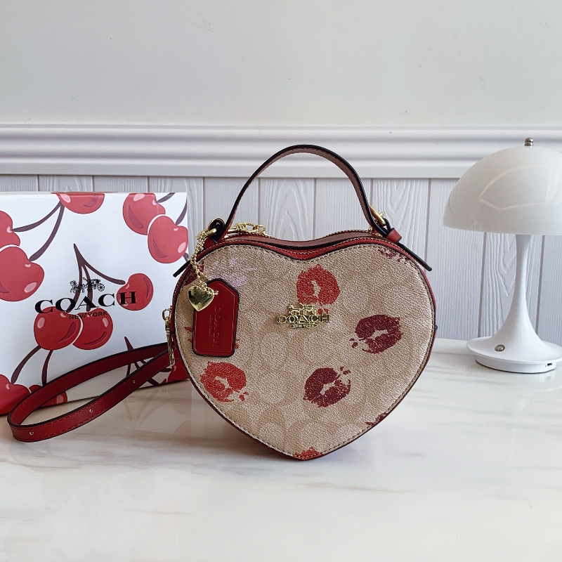 Coach's new cherry heart shoulder crossbody bag