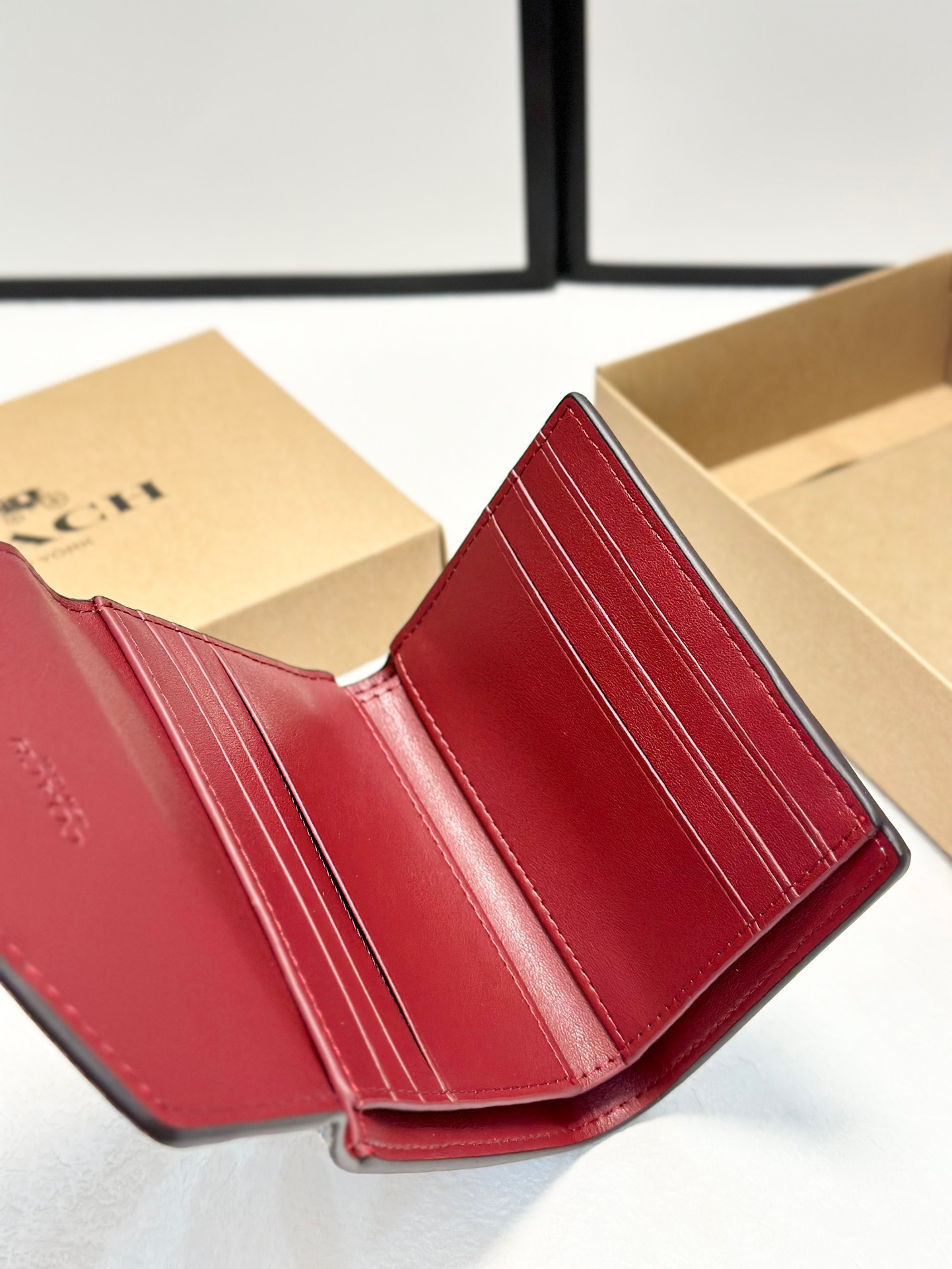 Coach printed tri-fold short wallet