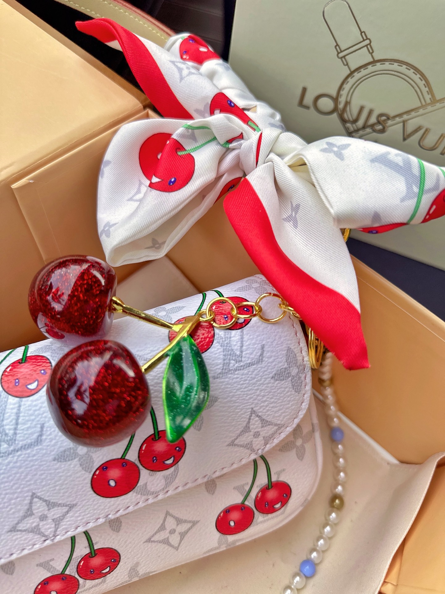 LV ivy woc cherry bag