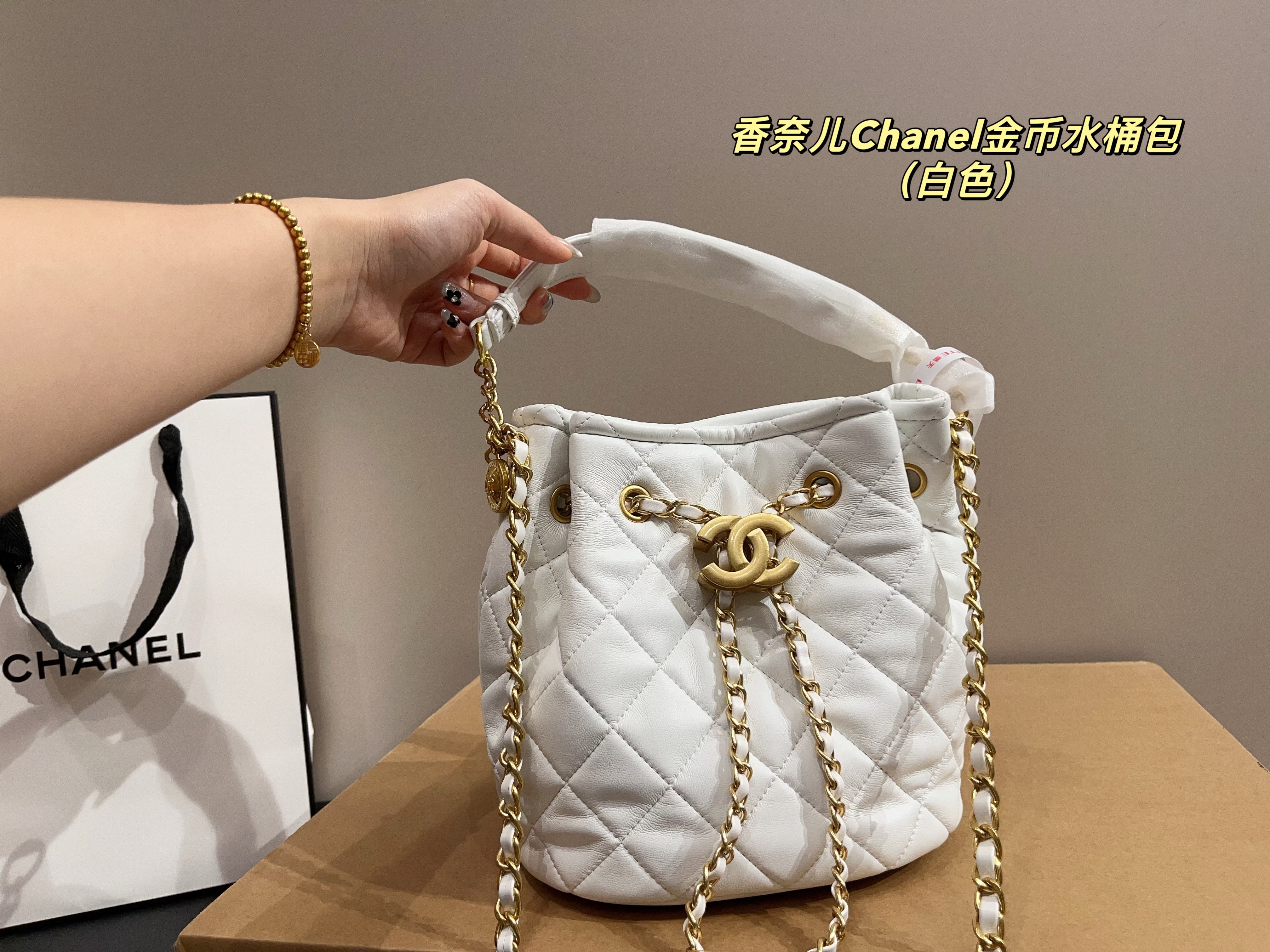 Chanel gold coin bucket bag