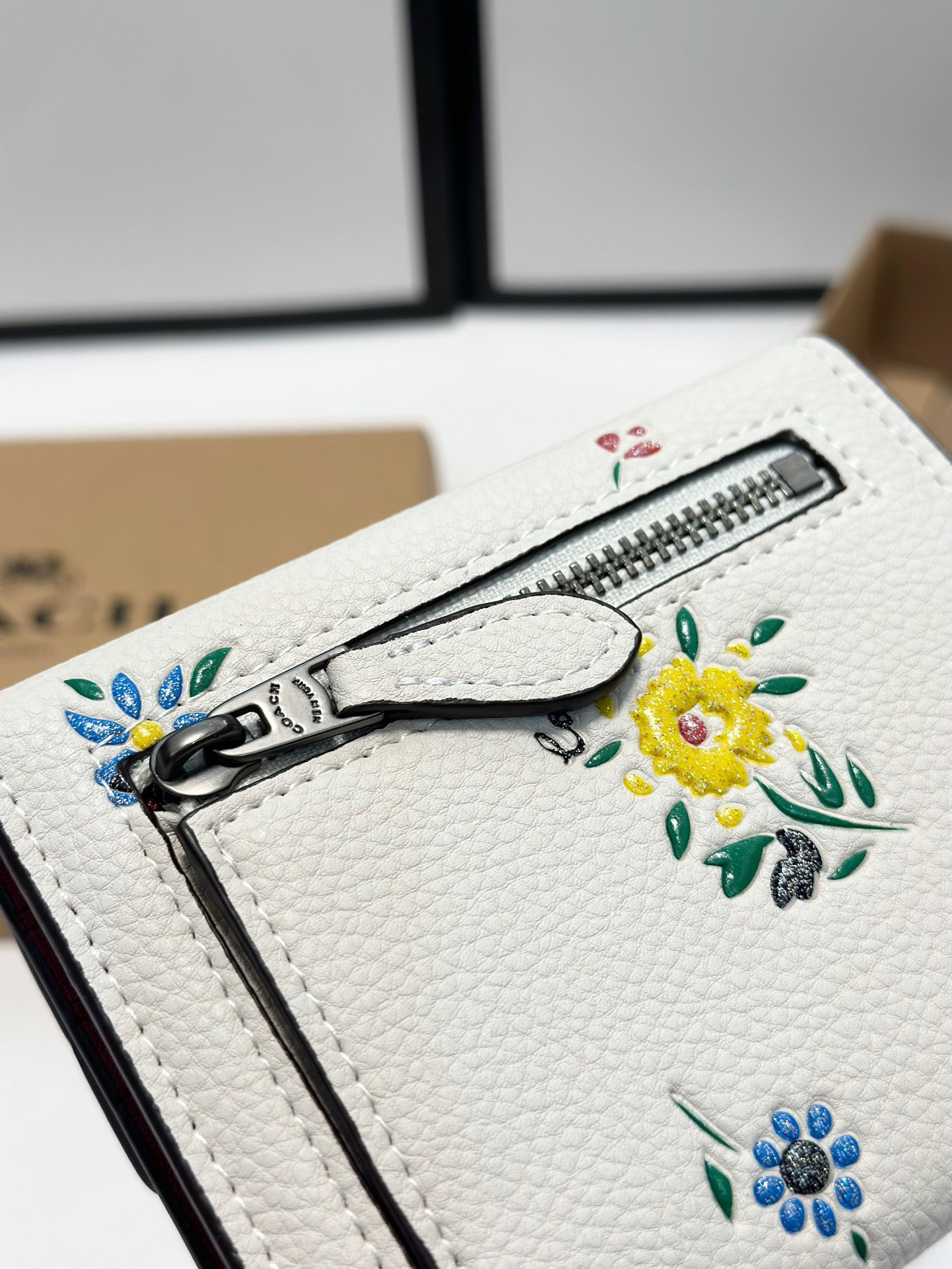 Coach printed tri-fold short wallet