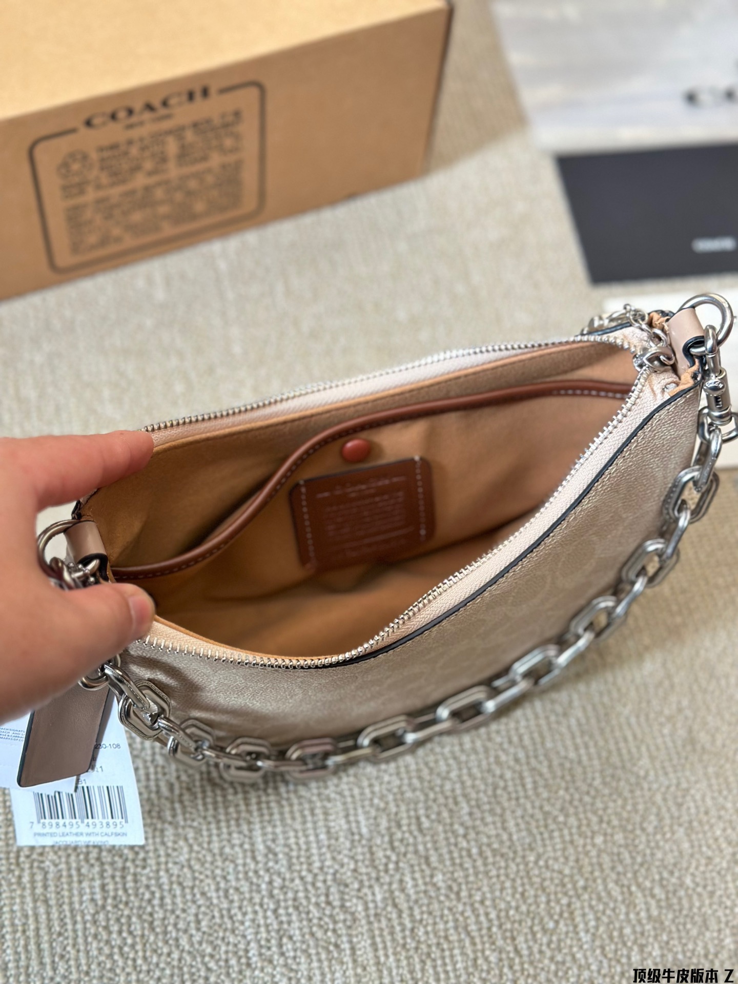 Coach's new crescent-shaped bag