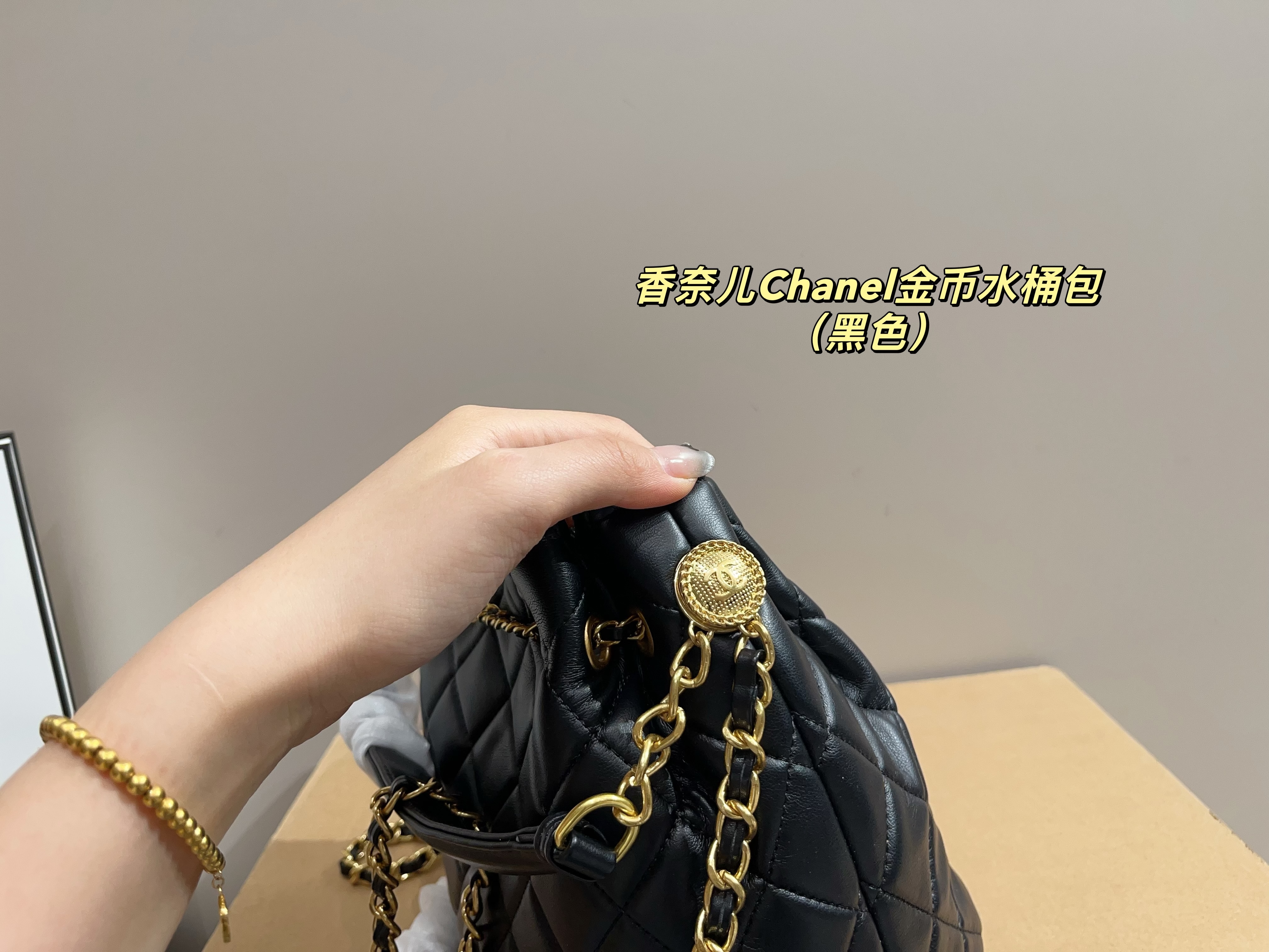 Chanel gold coin bucket bag