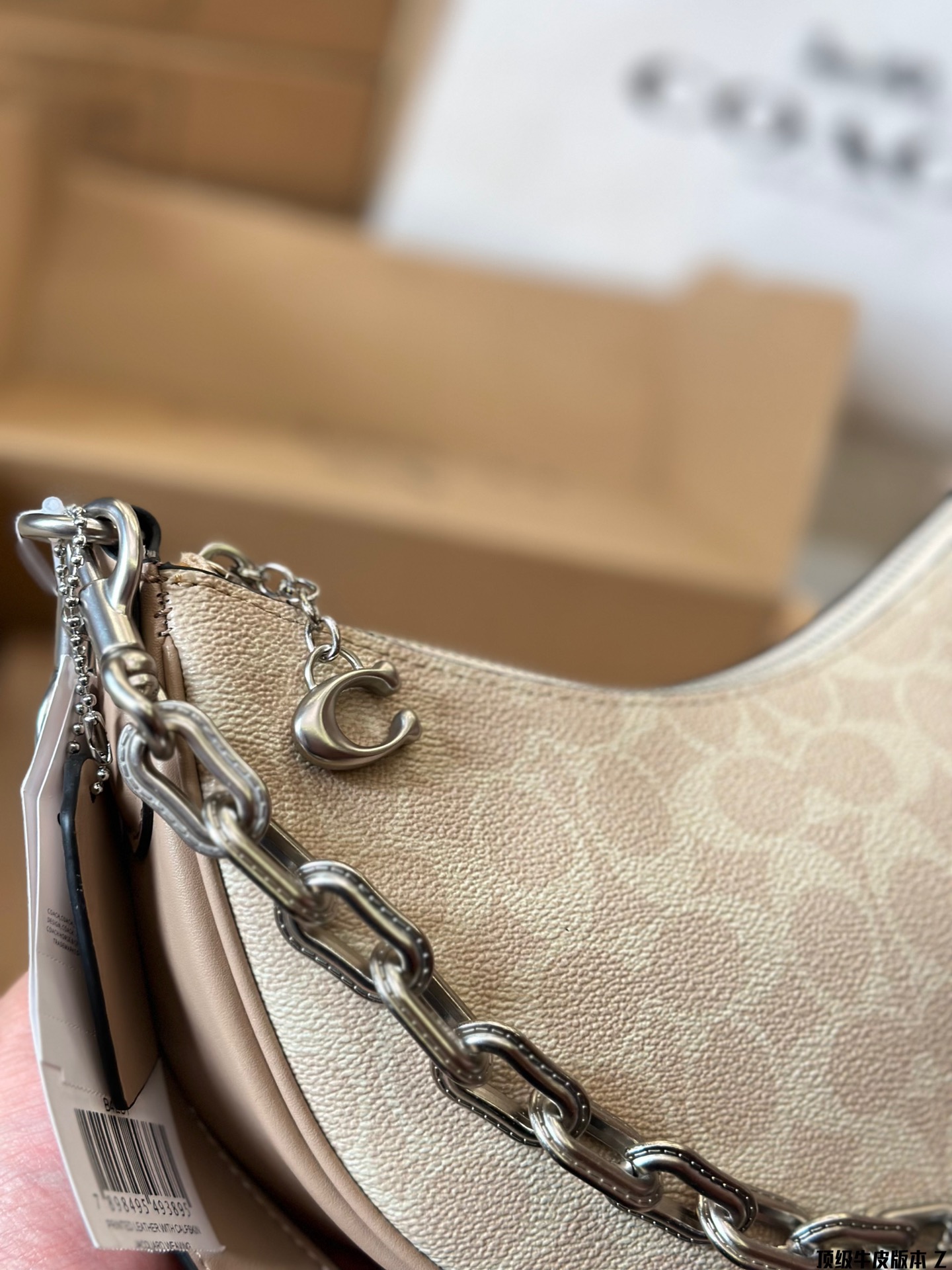 Coach's new crescent-shaped bag