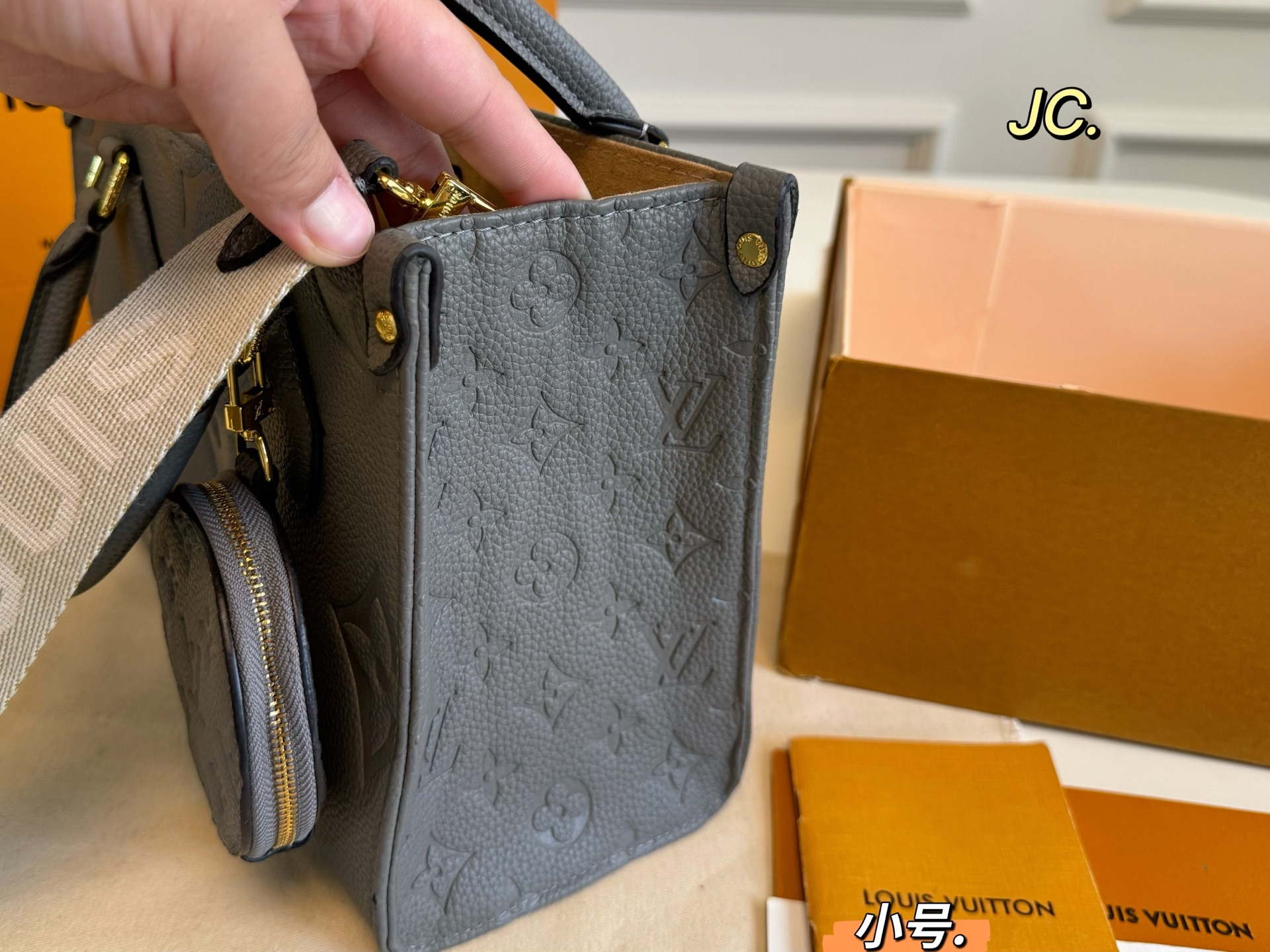 LV onthego embossed jungle tote bag