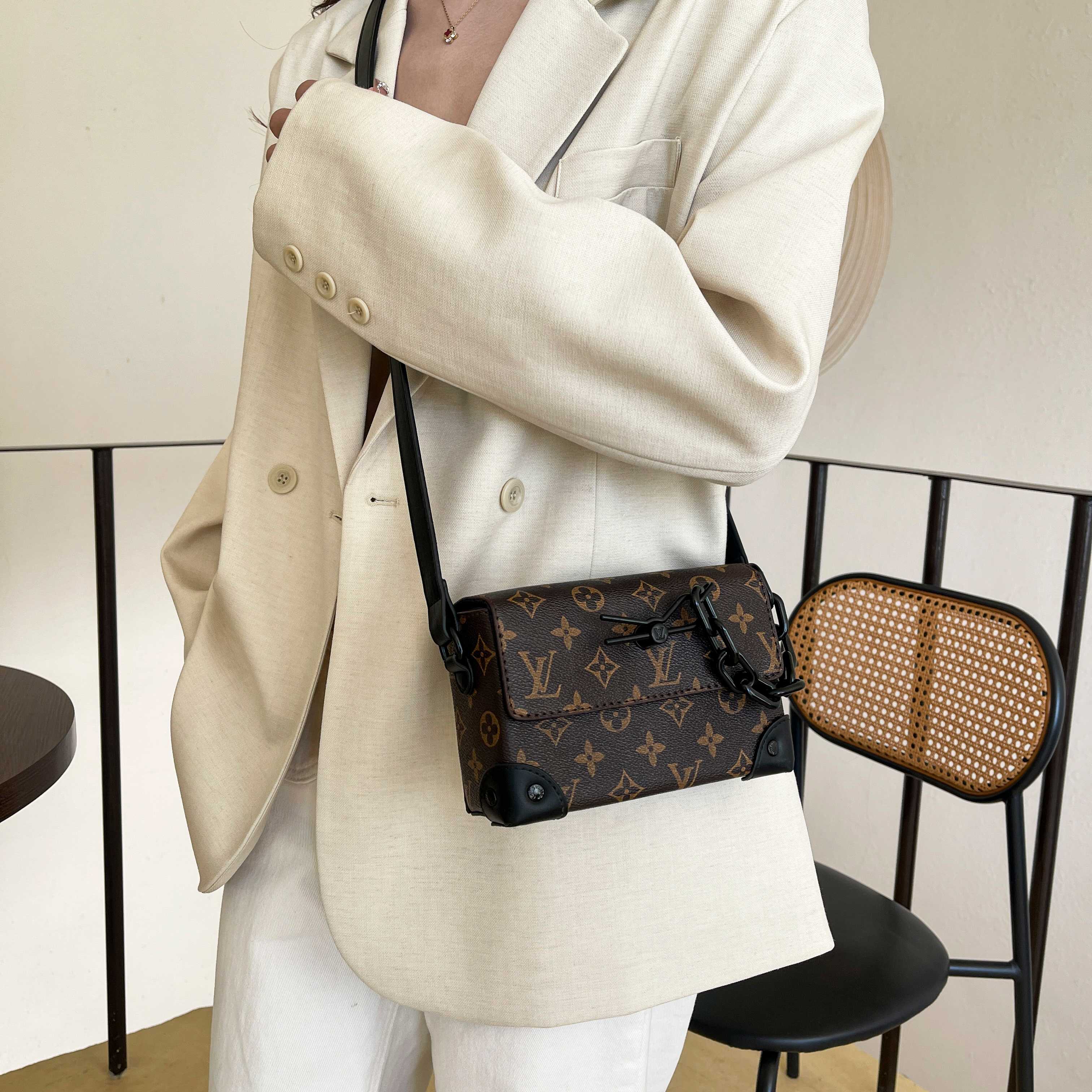 LV presbyopic chain embellished flap shoulder crossbody bag