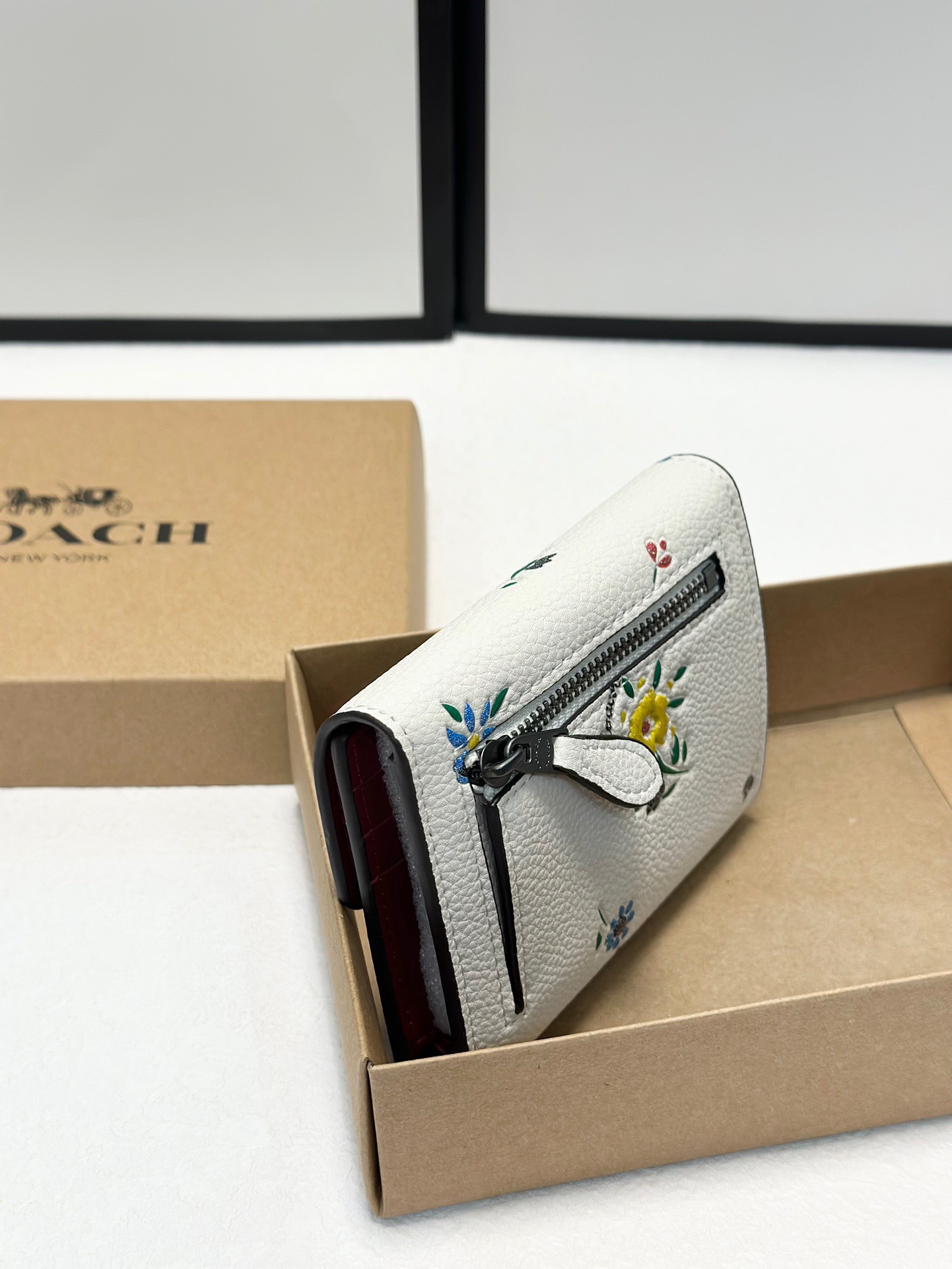 Coach printed tri-fold short wallet