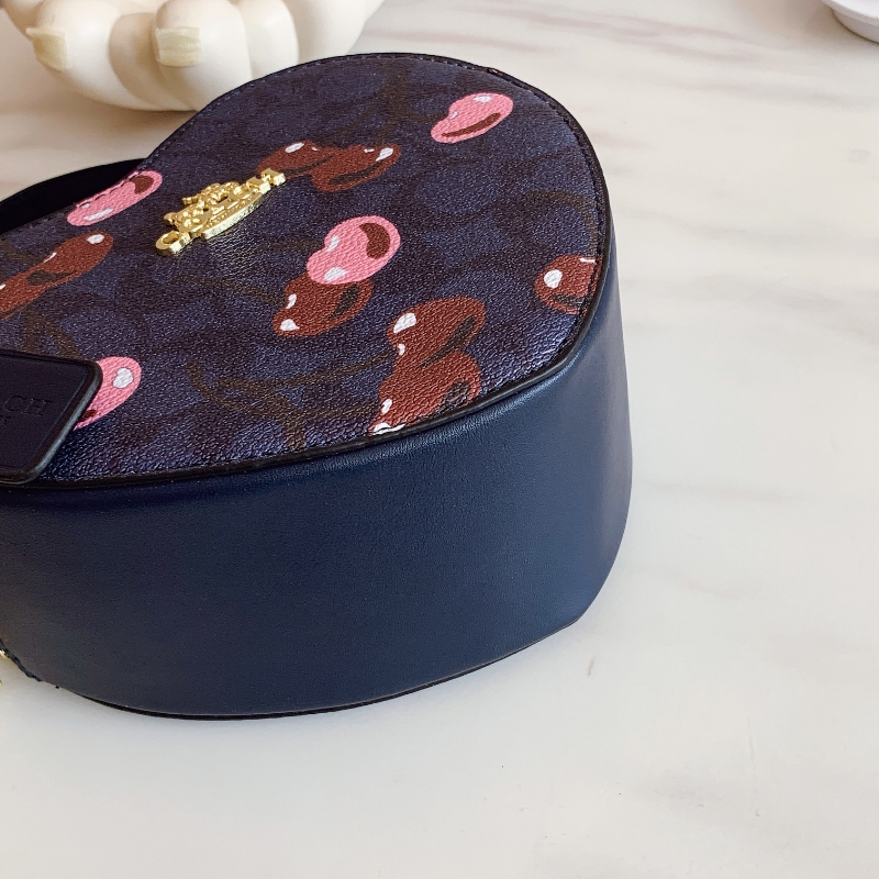 Coach's new cherry heart shoulder crossbody bag