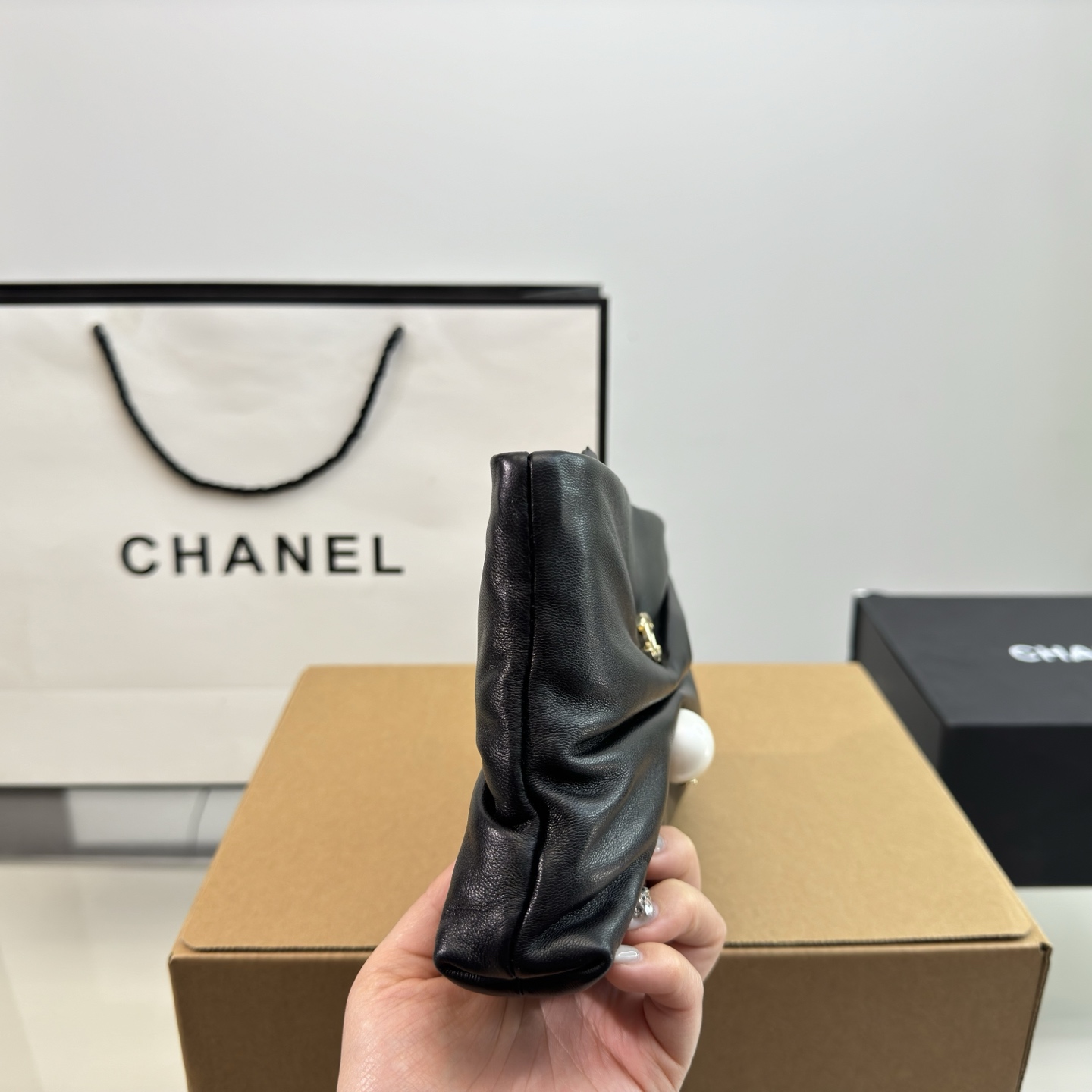 Chanel 25S Pearl bracelet bag