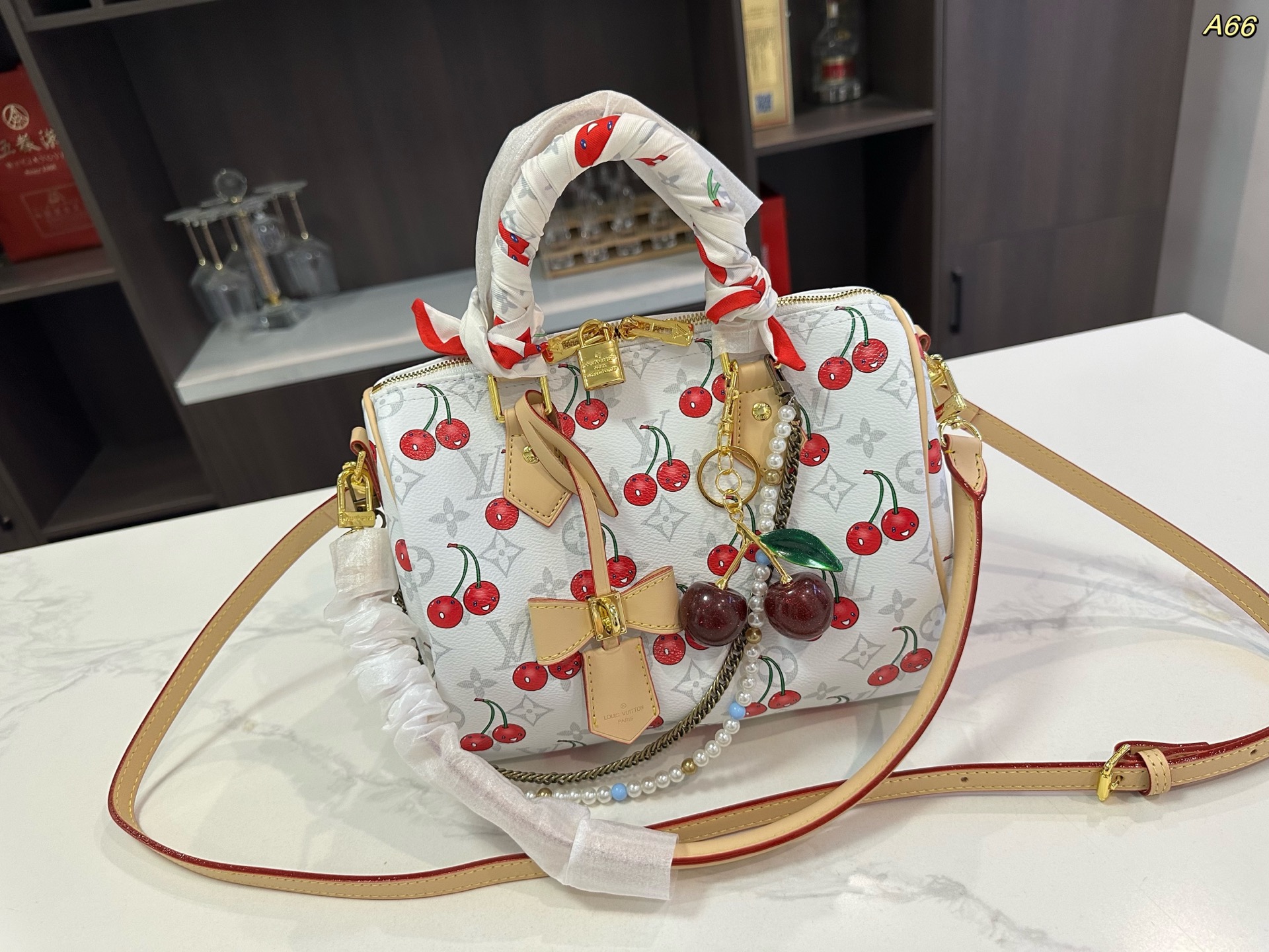 LV cherry pillow bag