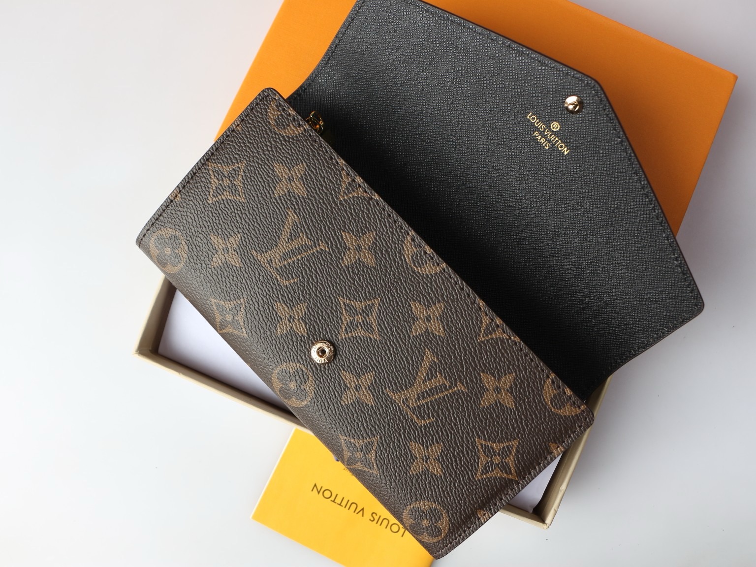 LV wallet square envelope style imprinted snap button