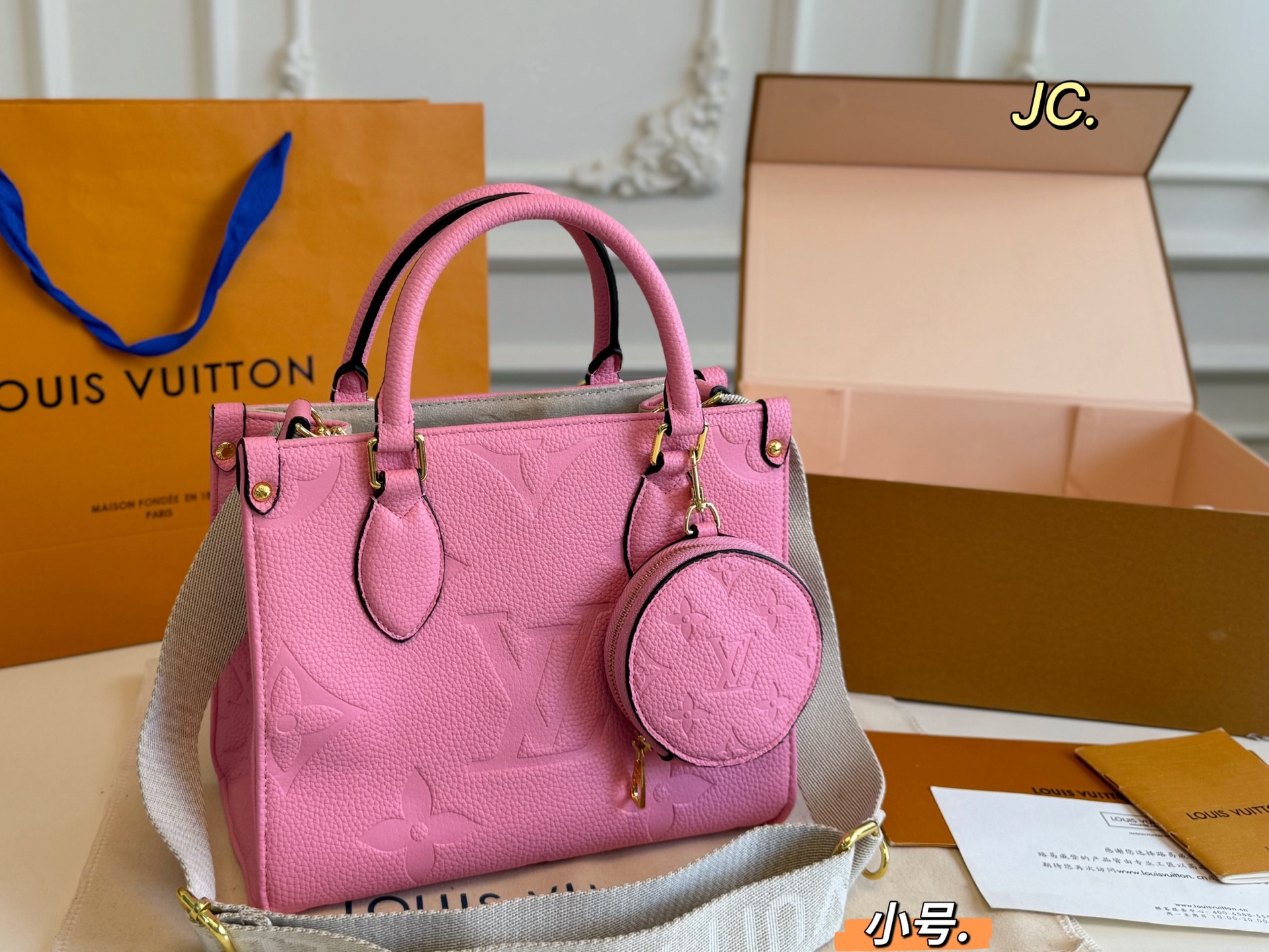 LV onthego embossed jungle tote bag