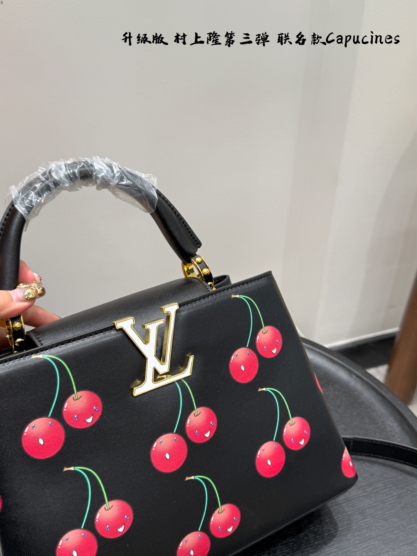 LV capucines cherry handbag