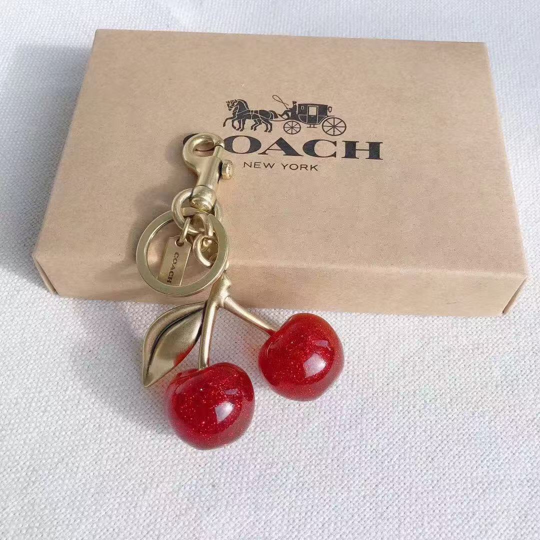 Coach cherry keychain