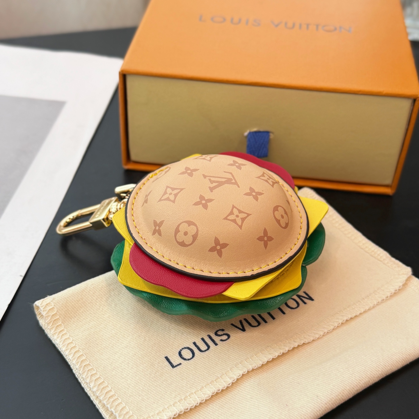 Louis Vuitton headphone case pendant