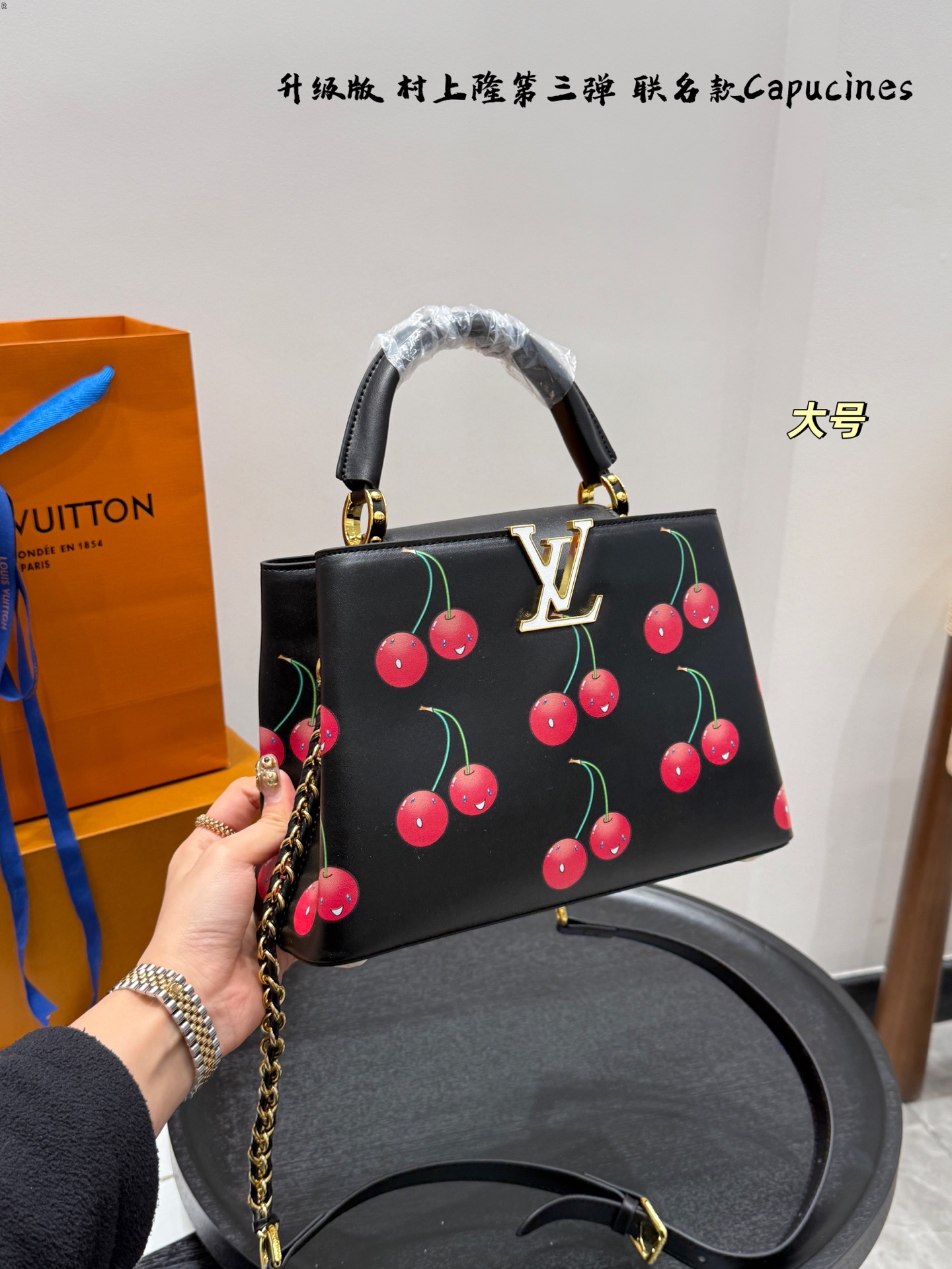 LV capucines cherry handbag