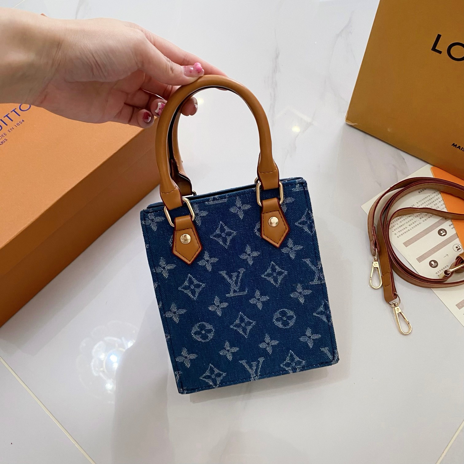 Louis Vuitton Presbyopia Series Handbag Commuting Mini Vertical Tote Bag Shoulder Crossbody Bag