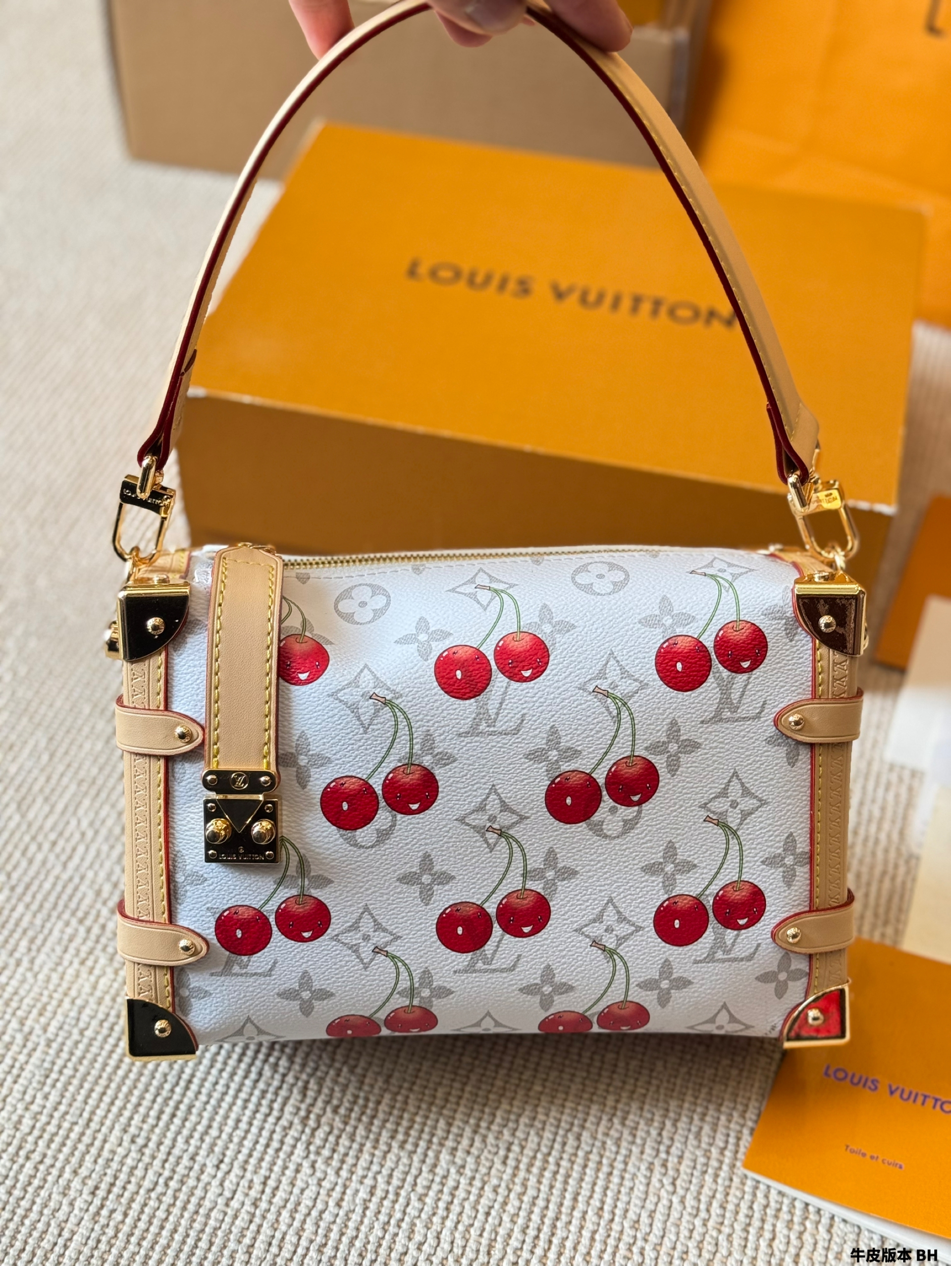 LV Side trunk cherry bag