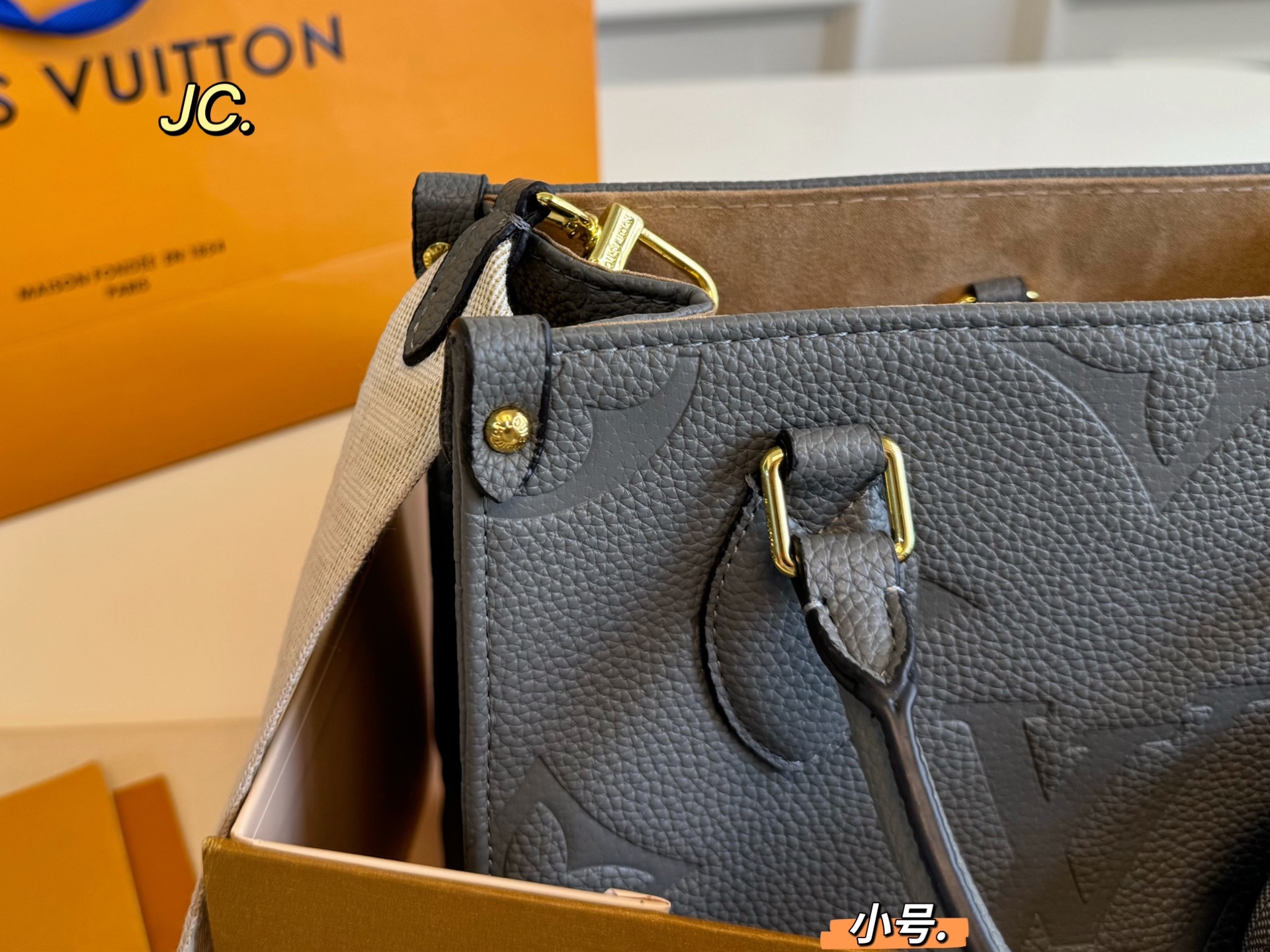 LV onthego embossed jungle tote bag