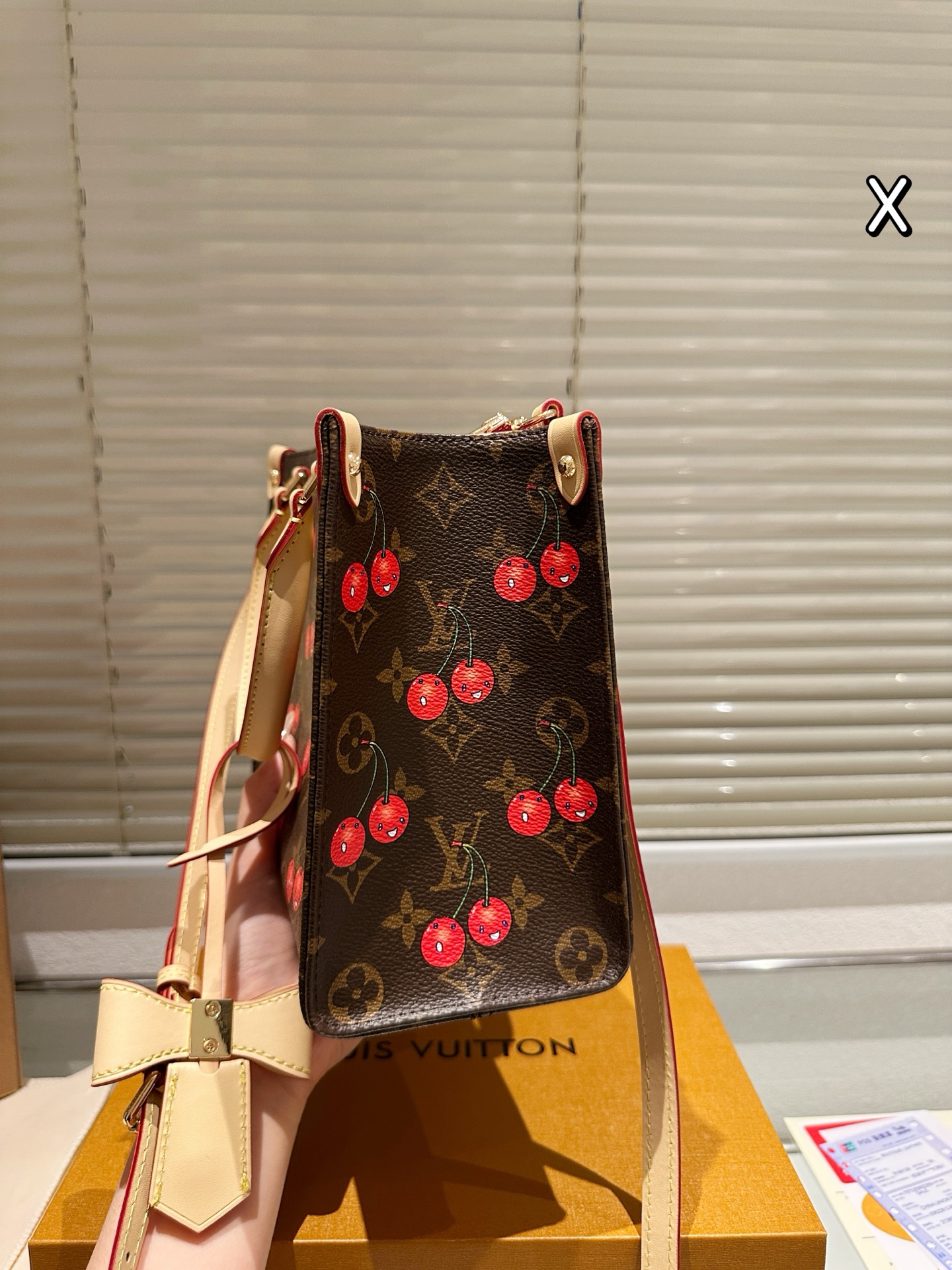 LV Onthego cherry print bag