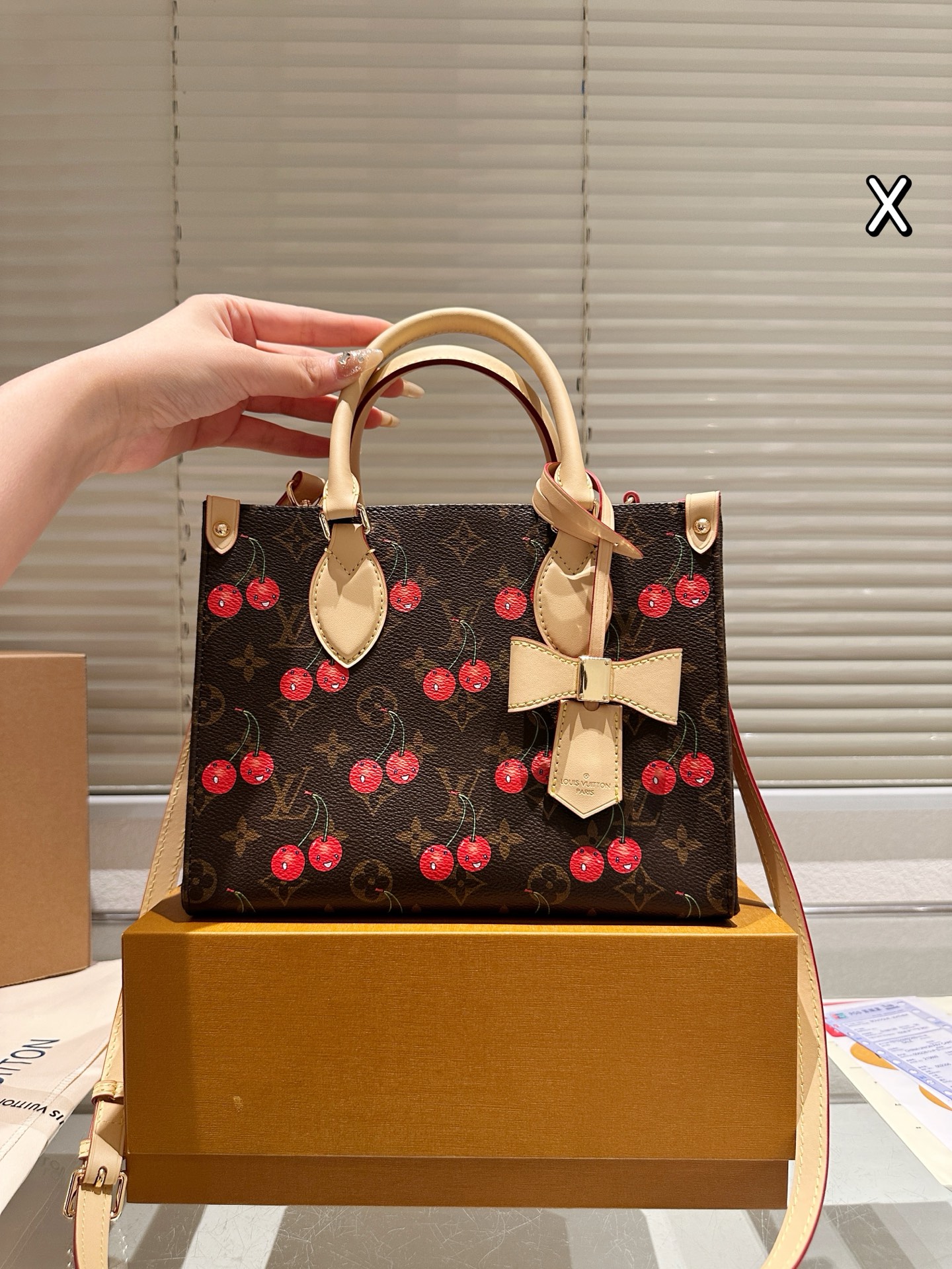 LV Onthego cherry print bag