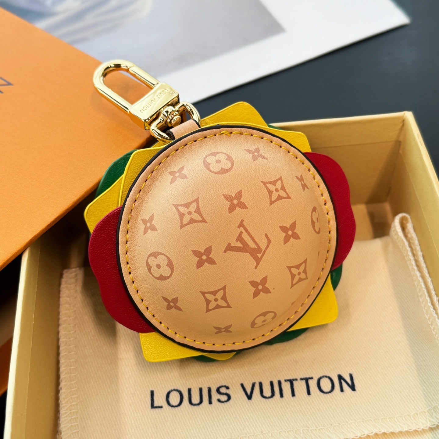 Louis Vuitton headphone case pendant