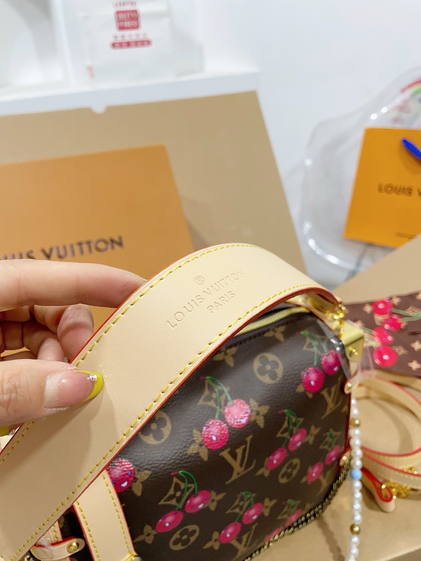 LV Side trunk cherry bag