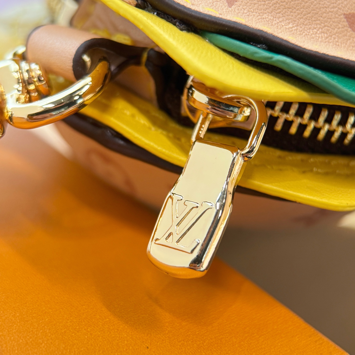 Louis Vuitton headphone case pendant