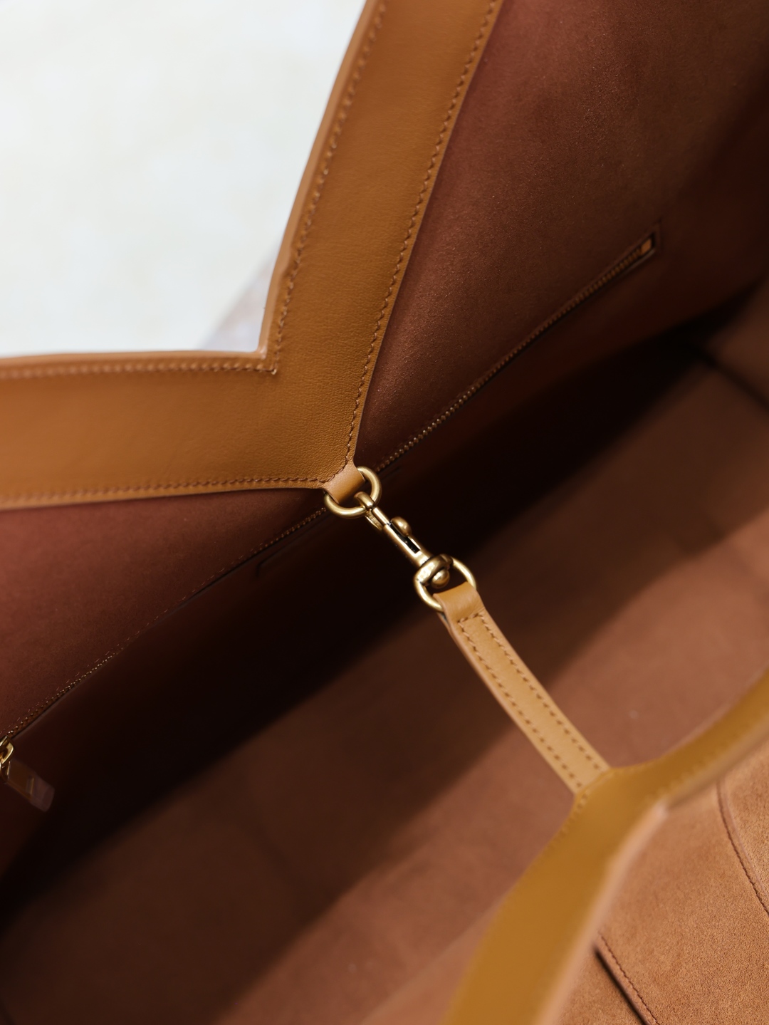 The top version of YSL suede tote bag