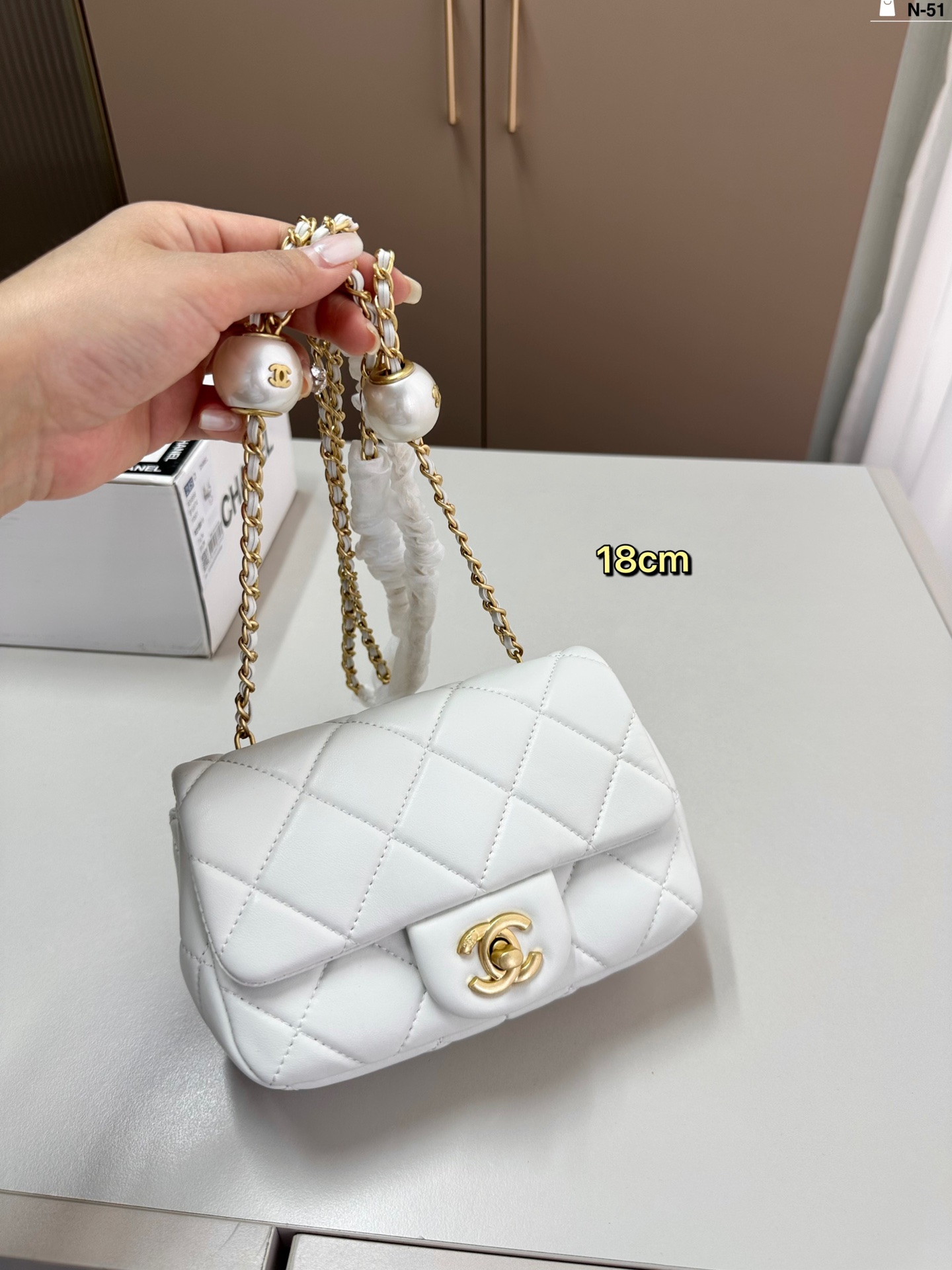Chanel 24ss Lagerfeld round-shaped bag