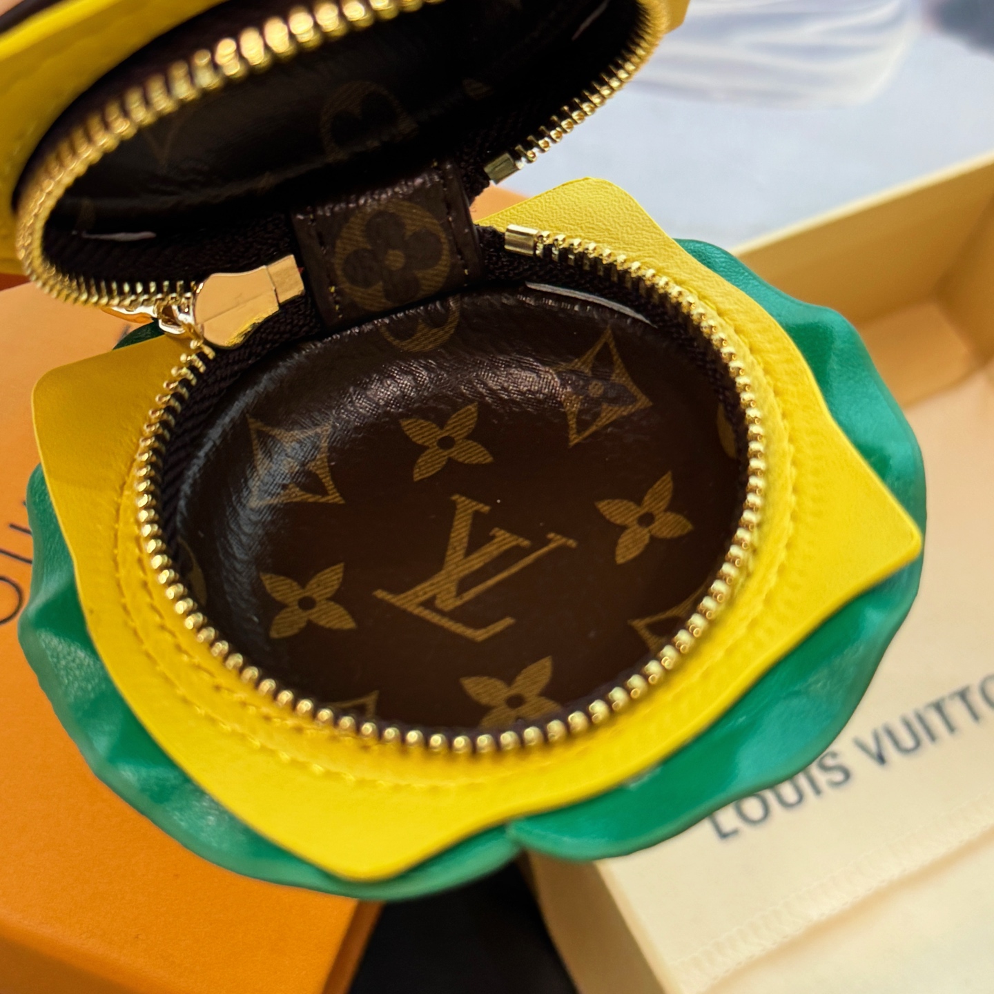 Louis Vuitton headphone case pendant