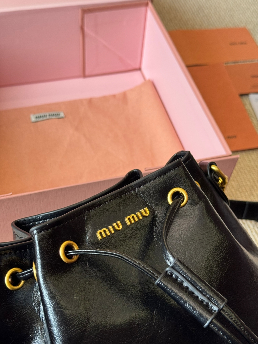 MiuMiu waxed leather small bucket bag